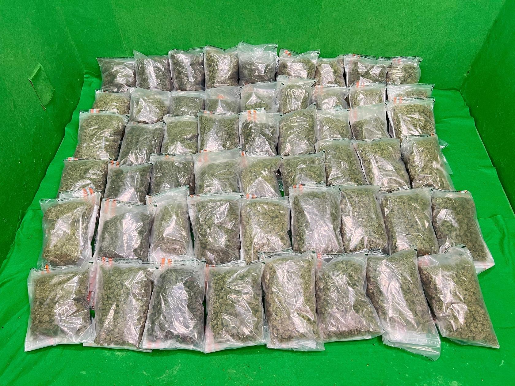 Hong Kong Customs yesterday (August 19) detected two dangerous drugs trafficking cases involving internal concealment and baggage concealment respectively at Hong Kong International Airport. About 1.3 kilograms of suspected cocaine and 16.5 kilograms of suspected cannabis buds were seized with an estimated market value of about $5 million. Photo shows the suspected cannabis buds seized. 