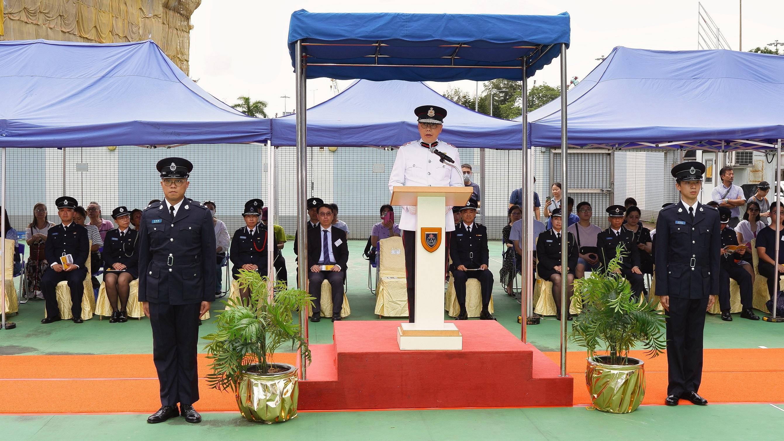 The Deputy Director of Fire Services (Operations), Mr Wong Chun-yip, delivers a speech at the 138th New Cadets Passing-out Parade of the Civil Aid Service Cadet Corps today (August 26).
