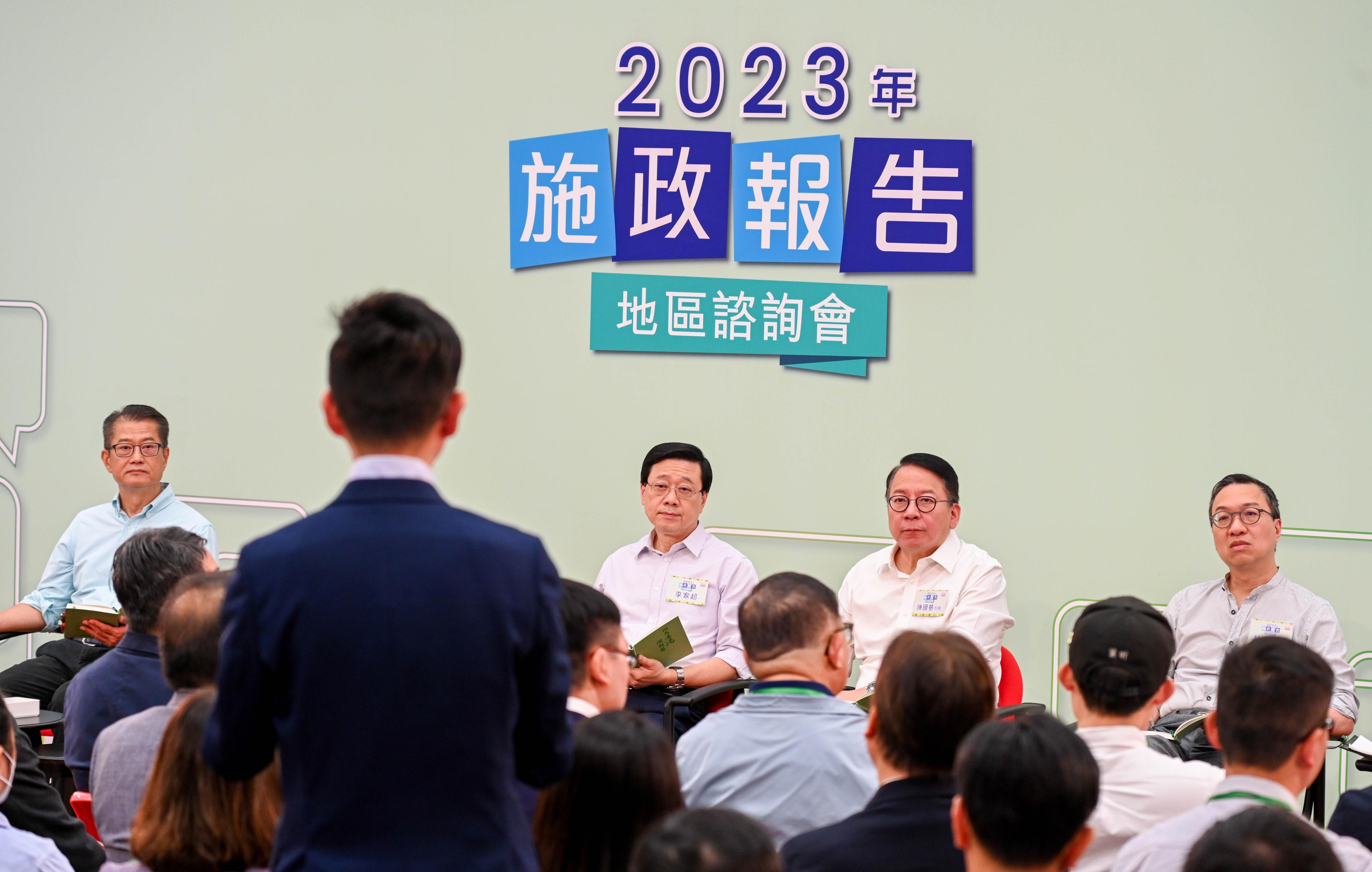 The Chief Executive, Mr John Lee, attended the second 2023 Policy Address District Forum with Principal Officials this morning (August 27) to listen to views and suggestions of local community members on the upcoming Policy Address. Photo shows Mr Lee (second left); the Chief Secretary for Administration, Mr Chan Kwok-ki (second right); the Financial Secretary, Mr Paul Chan (first left); and the Secretary for Justice, Mr Paul Lam, SC (first right), listening to views of the public at the consultation session.