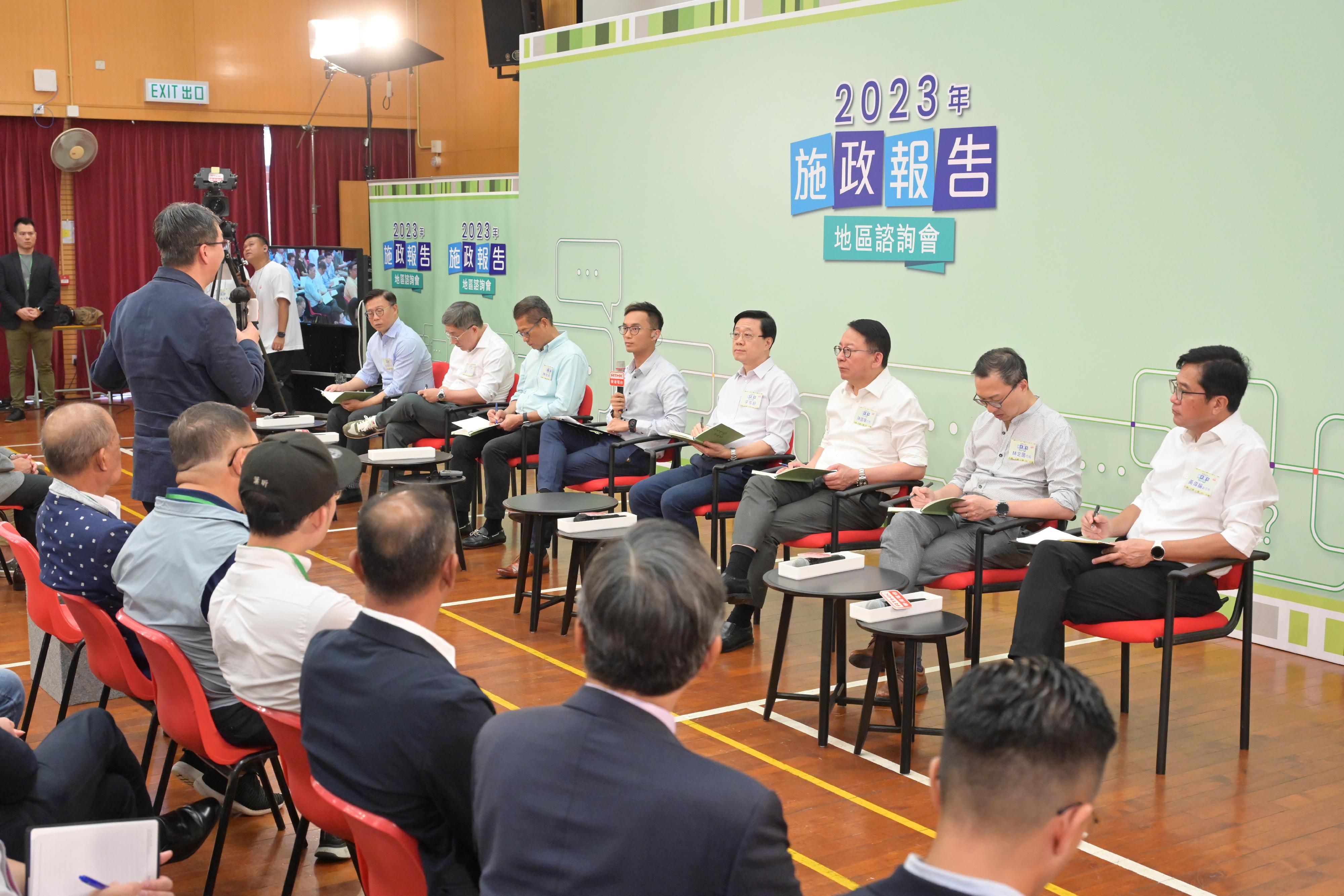 The Chief Executive, Mr John Lee, attended the second 2023 Policy Address District Forum with Principal Officials this morning (August 27) to listen to views and suggestions of local community members on the upcoming Policy Address. Photo shows Mr Lee (fourth right); the Chief Secretary for Administration, Mr Chan Kwok-ki (third right); the Financial Secretary, Mr Paul Chan (third left); the Secretary for Justice, Mr Paul Lam, SC (second right); the Deputy Chief Secretary for Administration, Mr Cheuk Wing-hing (second left); the Deputy Financial Secretary, Mr Michael Wong (first right); and the Deputy Secretary for Justice, Mr Cheung Kwok-kwan (first left), listening to views of the public at the consultation session.