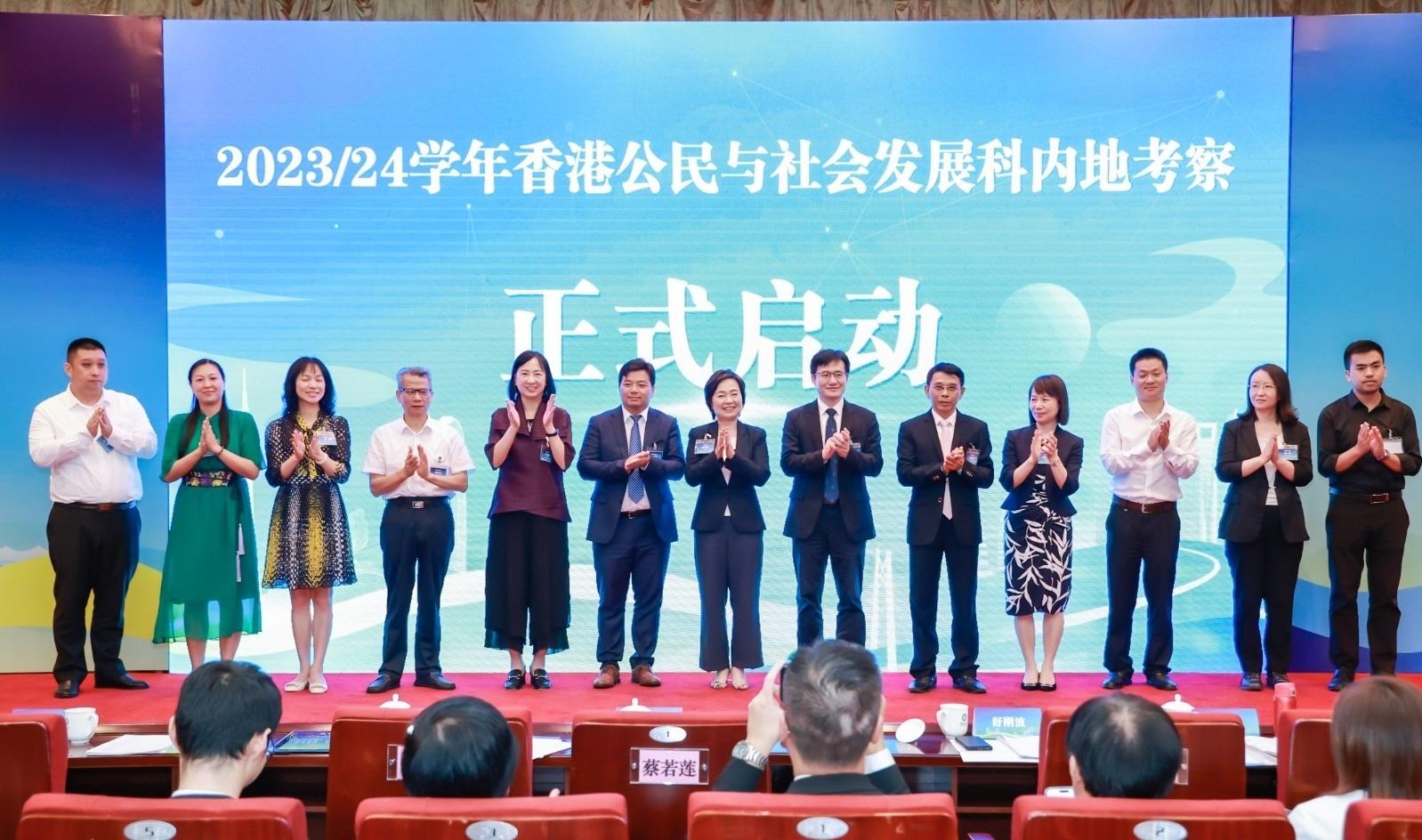 The Secretary for Education, Dr Choi Yuk-lin (centre); the Permanent Secretary for Education, Ms Michelle Li (fifth left); the Director-General of the Department of Educational, Scientific and Technological Affairs of the Liaison Office of the Central People's Government in the Hong Kong Special Administration Region, Dr Wang Weiming (sixth right); the Deputy Director of the Office of Hong Kong, Macao, and Taiwan Affairs of the Ministry of Education, Mr Shu Gangbo (sixth left); and the First-level Inspector of the Department of Education of Guangdong Province, Dr Zhu Chaohua (fifth right), officiate at the launch ceremony to mark the beginning of the Citizenship and Social Development Mainland study tours in the new school year in Guangzhou today (August 28).