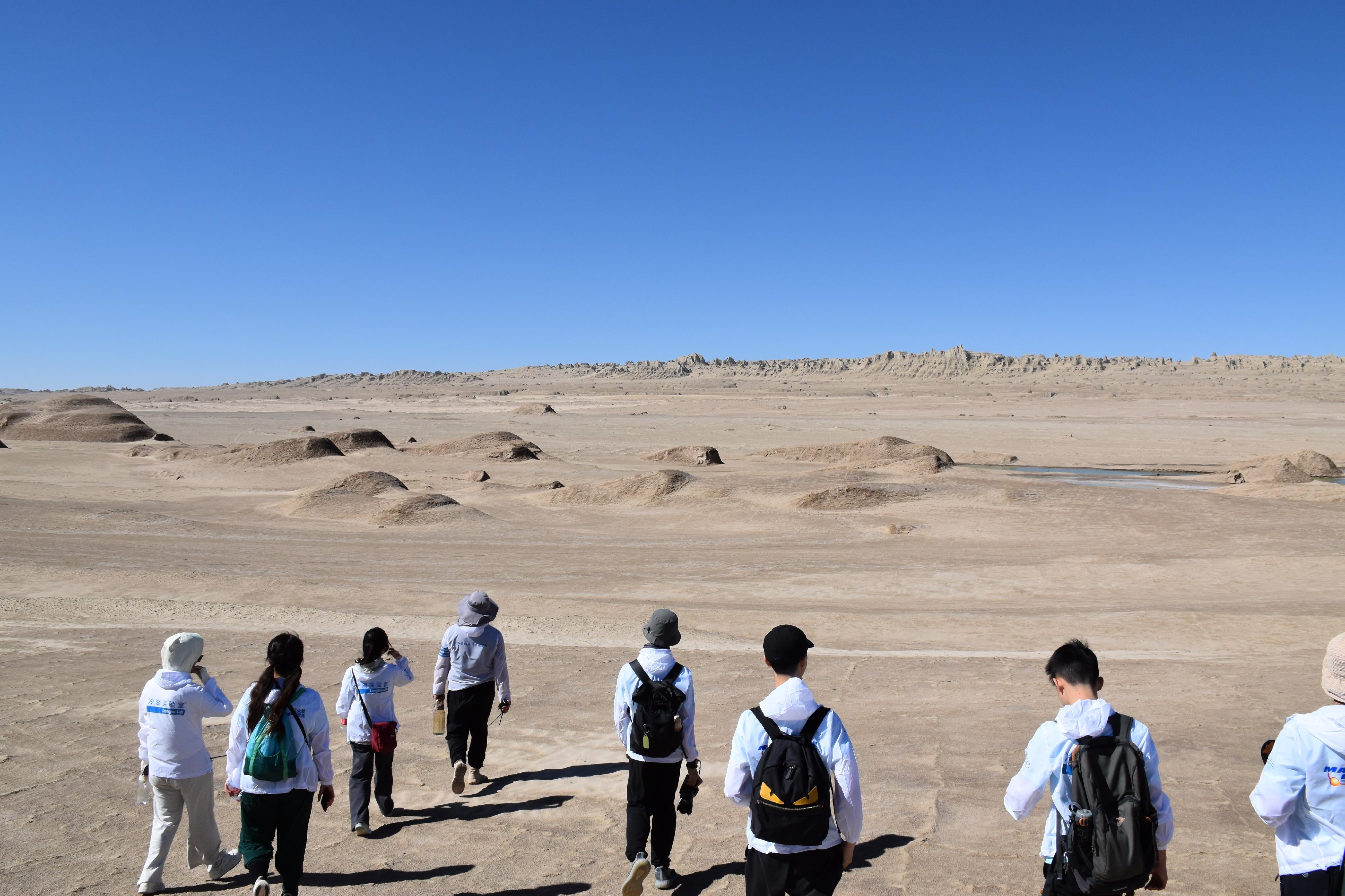 Thirty secondary students have finished the Young Astronaut Training Camp 2023 implemented by the Hong Kong Space Museum. Photo shows students exploring the geological features at the Leng Hu Mars Camp in Qinghai. 