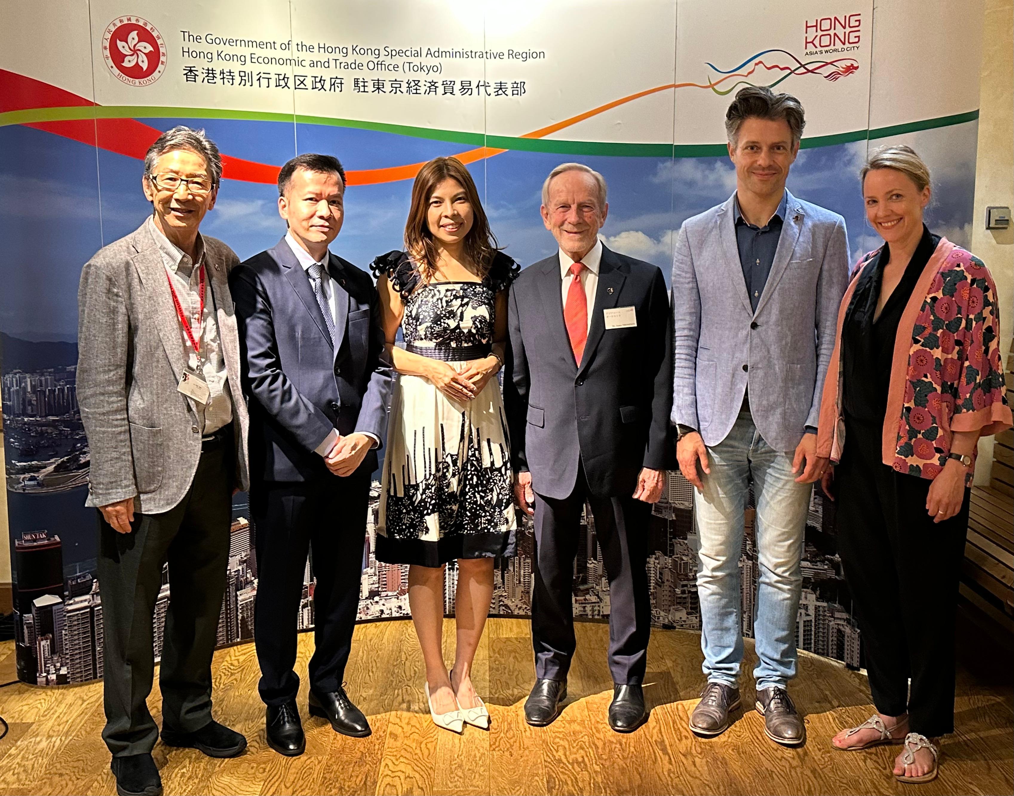 The Principal Hong Kong Economic and Trade Representative (Tokyo), Miss Winsome Au (third left), is pictured with the Asian Youth Orchestra (AYO)'s Chairman, Mr James Thompson (third right); the Chief Executive Officer, Mr Keith Lau (second left); the Representative, Japan, Mr Kano Kunio (first left); the Principal Conductor, Mr Joseph Bastian (second right); and Soprano Ms Lydia Teuscher (first right) before a concert at the Tokyo Opera City Concert Hall in Tokyo, Japan, today (August 31).
