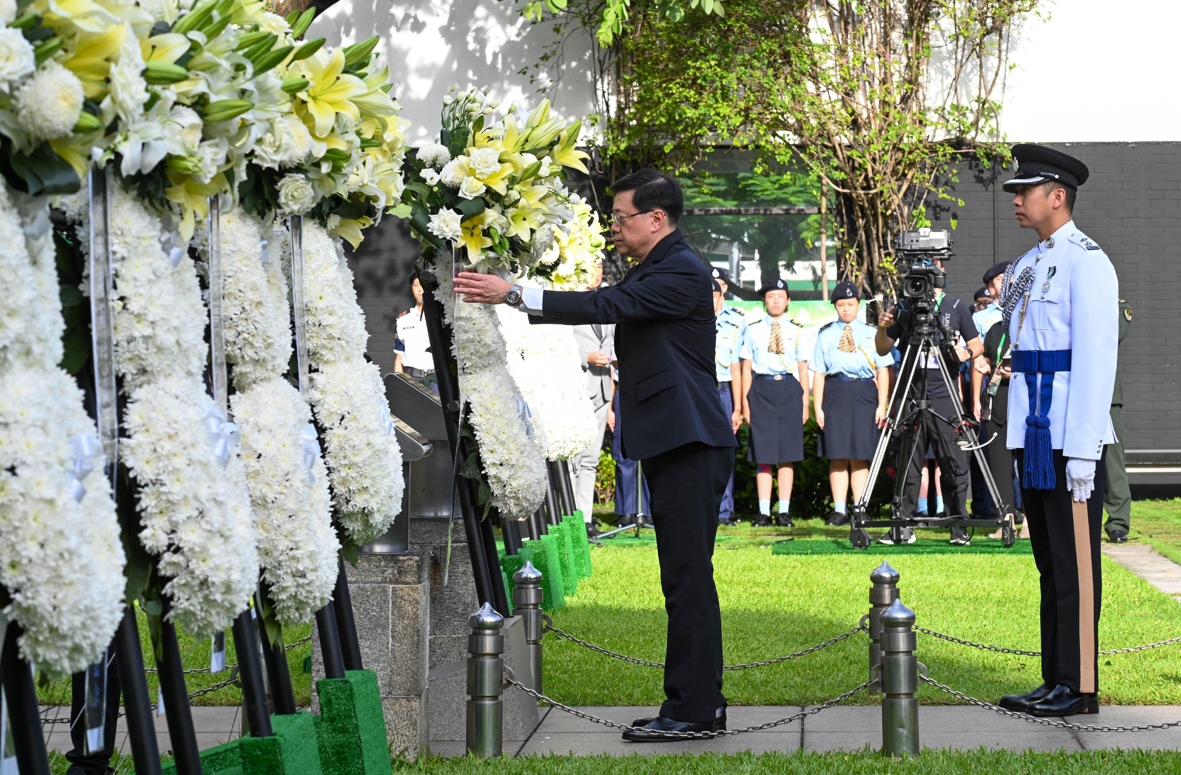 The Chief Executive, Mr John Lee, attends a ceremony to commemorate the victory day of the Chinese People's War of Resistance Against Japanese Aggression at Hong Kong City Hall Memorial Garden this morning (September 3).