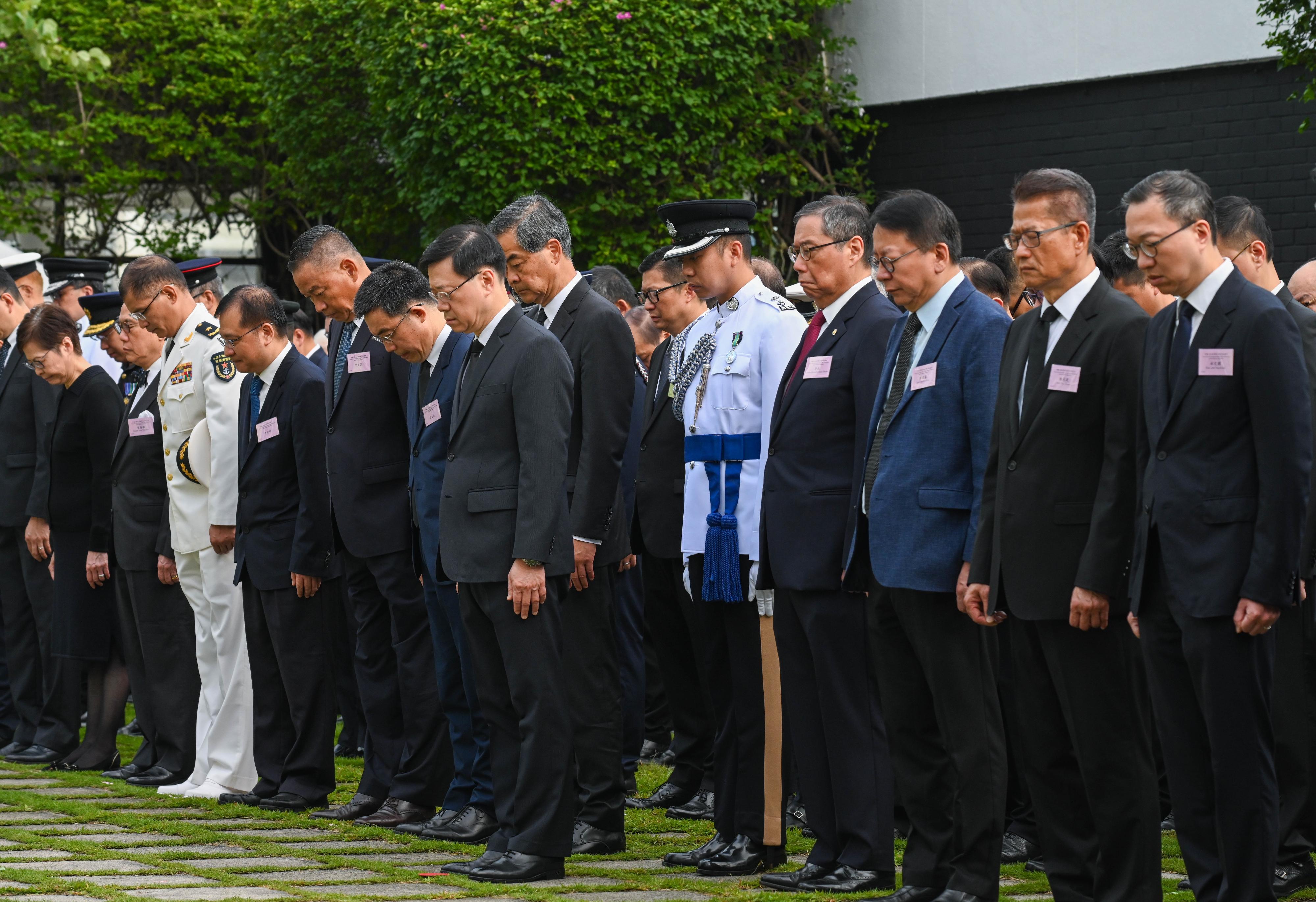 The Chief Executive, Mr John Lee, attended a ceremony to commemorate the victory day of the Chinese People's War of Resistance Against Japanese Aggression at Hong Kong City Hall Memorial Garden this morning (September 3). Photo shows (front row, from right) the Secretary for Justice, Mr Paul Lam, SC; the Financial Secretary, Mr Paul Chan; the Chief Secretary for Administration, Mr Chan Kwok-ki; the Acting Chief Justice of the Court of Final Appeal, Mr Justice Roberto Alexandre Vieira Ribeiro; the Aide-de-Camp, Mr Ralph Chong; Mr John Lee; Vice-Chairman of the National Committee of the Chinese People's Political Consultative Conference Mr C Y Leung; Deputy Secretary General of the Liaison Office of the Central People's Government in the Hong Kong Special Administrative Region (HKSAR) Mr Xiao Youmei; the Director of the liaison office of the Office for Safeguarding National Security of the Central People's Government in the HKSAR, Mr Deng Jianwei; the Acting Commissioner of the Office of the Commissioner of the Ministry of Foreign Affairs of the People's Republic of China in the HKSAR, Mr Fang Jianming; Deputy Commander of the Chinese People's Liberation Army Hong Kong Garrison Navy Rear Admiral Tan Zhiwei; former Chief Executive Mr Donald Tsang and former Chief Executive Mrs Carrie Lam attending the ceremony.

