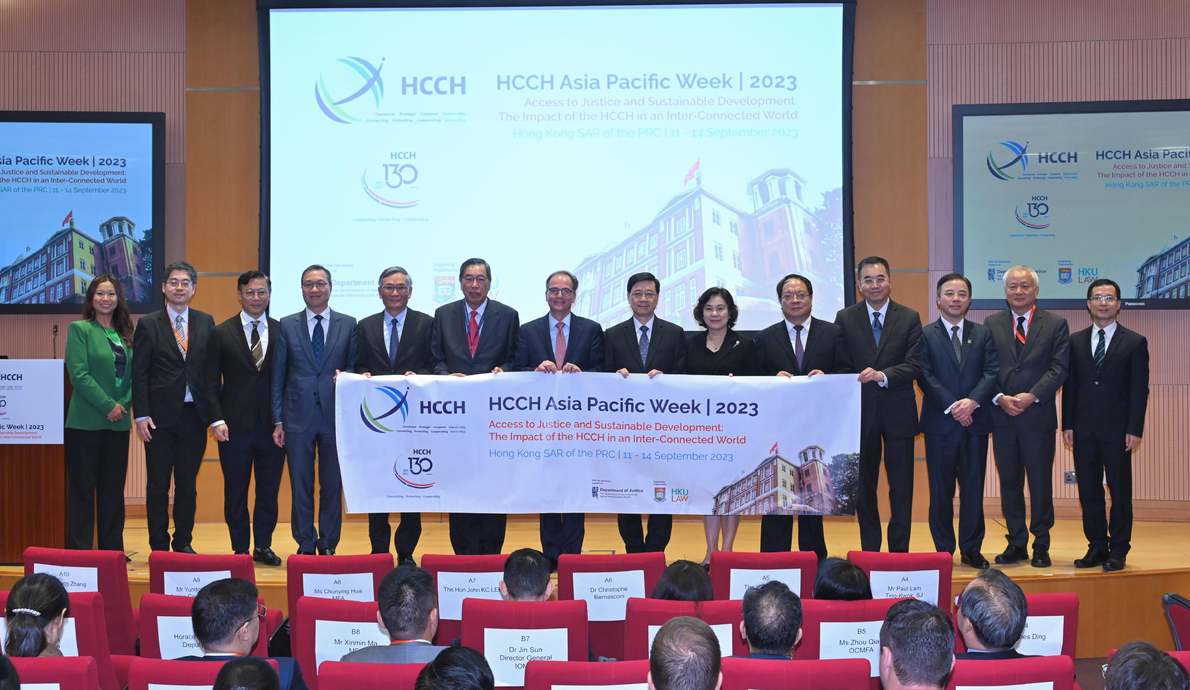 The Chief Executive, Mr John Lee, attended the HCCH Asia Pacific Week 2023 today (September 11). Photo shows (from third left) the Deputy Secretary for Justice, Mr Cheung Kwok-kwan; the Secretary for Justice, Mr Paul Lam, SC; the Chief Justice of the Court of Final Appeal, Mr Andrew Cheung Kui-nung; the President of the Legislative Council, Mr Andrew Leung; the Secretary General of the Hague Conference on Private International Law, Dr Christophe Bernasconi; Mr Lee; member of the CPC Committee of the Ministry of Foreign Affairs and Assistant Minister of Foreign Affairs, Ms Hua Chunying; the Acting Commissioner of the Office of the Commissioner of the Ministry of Foreign Affairs of the People's Republic of China in the Hong Kong Special Administrative Region, Mr Pan Yundong, and other guests at the event.