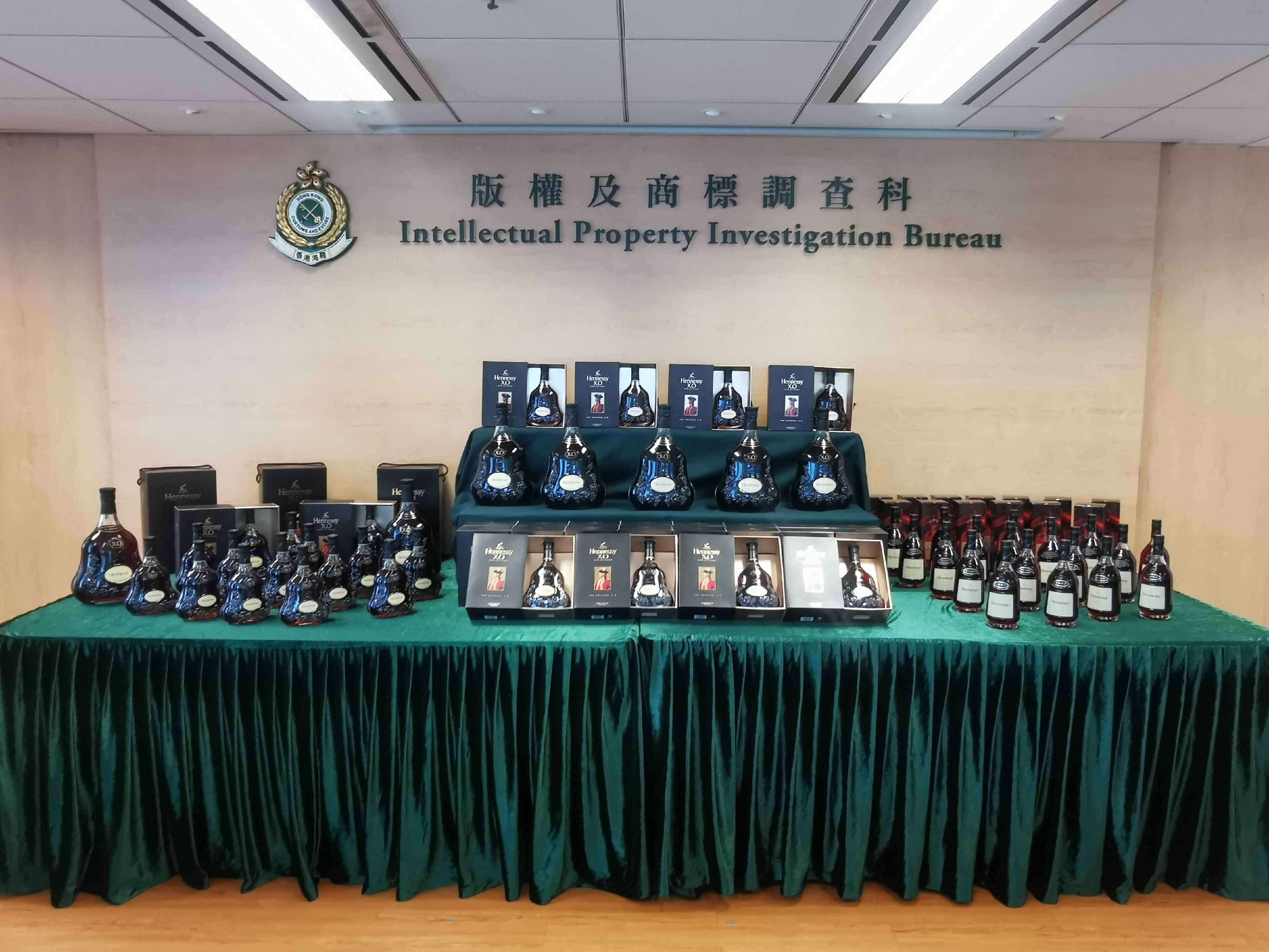 Hong Kong Customs yesterday (September 12) mounted a special enforcement operation in various districts to combat the sale of counterfeit liquor. A total of about 230 bottles of liquor, with a total volume of about 190 litres and an estimated market value of about $340,000, were seized. Photo shows some of the suspected counterfeit liquor seized.