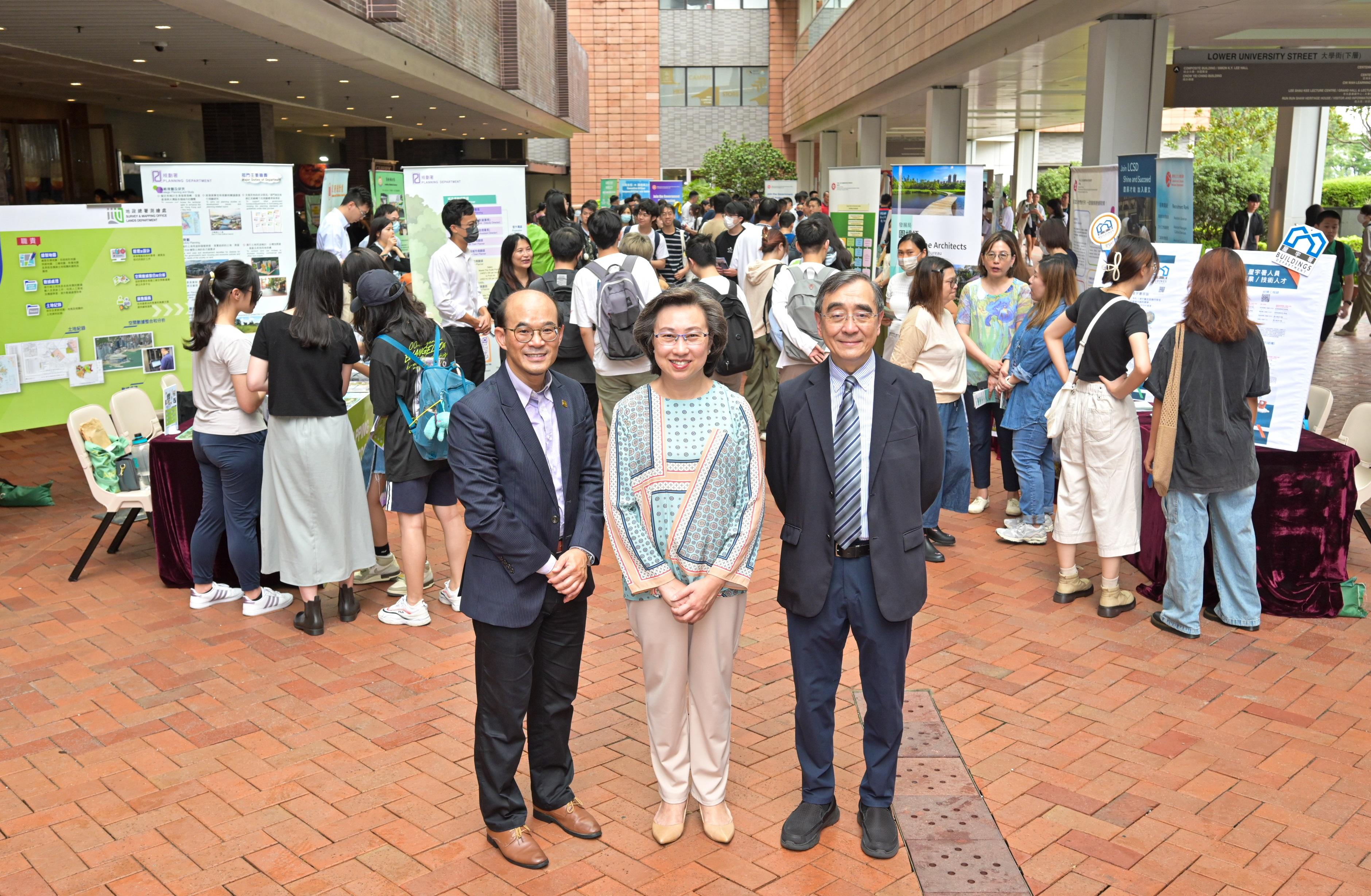 The Secretary for the Civil Service, Mrs Ingrid Yeung, visited the University of Hong Kong today (September 14). She toured the Government Career Fair being held at the campus with the Provost and Deputy Vice-Chancellor of the university, Professor Richard Wong, and encouraged students to join the civil service to serve the public. Mrs Yeung (centre) is pictured with Professor Wong (right) and the Dean of Student Affairs, Professor Samson Tse (left), at the fair.