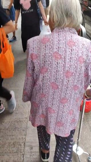 Wang Xiao-ying, aged 88, is about 1.4 metres tall, 40 kilograms in weight and of thin build. She has a square face with yellow complexion and short white hair. She was last seen wearing a pink floral shirt, trousers, a black headband and carrying a walking stick.