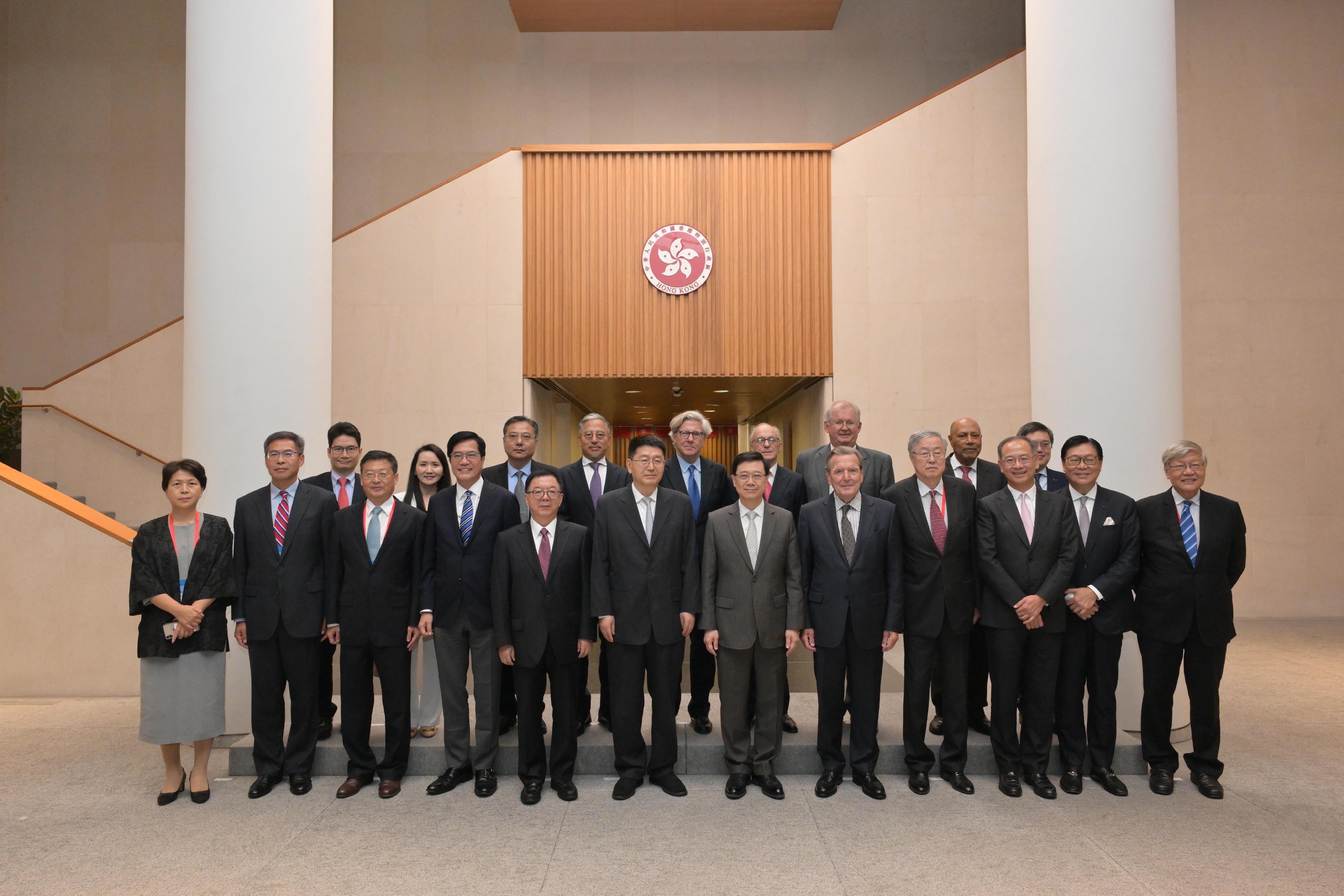 The Chief Executive, Mr John Lee (front row, sixth right), today (September 19) meets with the Chairman and Chief Executive Officer of China Investment Corporation (CIC), Mr Peng Chun (front row, sixth left), and members of the International Advisory Council of CIC. The Deputy Financial Secretary, Mr Michael Wong (front row, fourth left); the Chief Executive of the Hong Kong Monetary Authority, Mr Eddie Yue (front row, third right); and the Acting Secretary for Financial Services and the Treasury, Mr Joseph Chan (back row, first left), also joined the meeting.