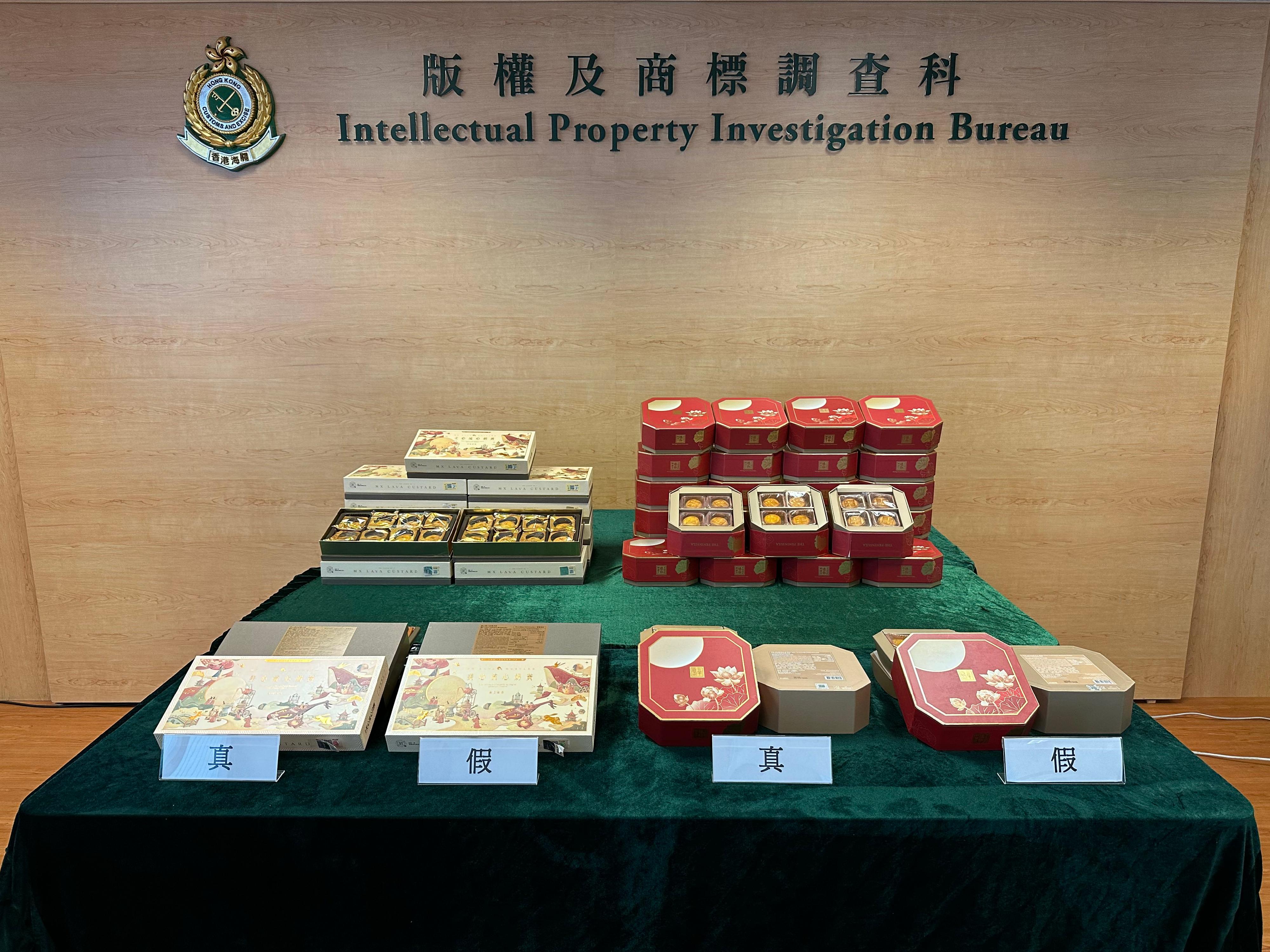 Hong Kong Customs has mounted a special operation since September 14 to combat the online sale of counterfeit mooncakes. A total of 49 boxes of suspected counterfeit mooncakes, with a total estimated market value of about $16,000, have been seized as of today (September 20). Photo shows some of the suspected counterfeit mooncakes seized, along with authentic mooncakes provided by trademark owners.