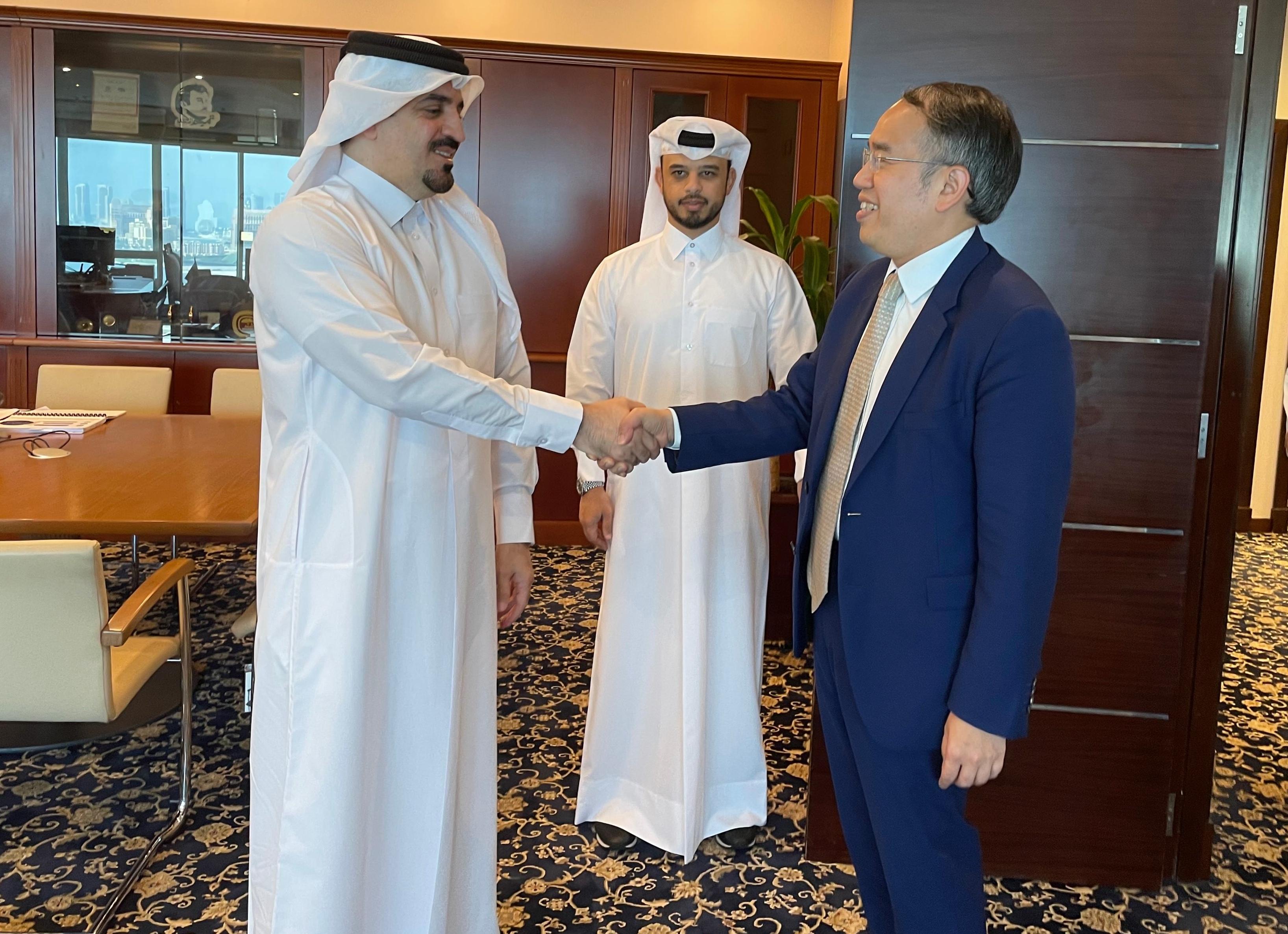The Secretary for Financial Services and the Treasury, Mr Christopher Hui, has begun his visit to Qatar. Photo shows Mr Hui (right) meeting with the Chief Executive Officer of the Qatar Financial Markets Authority, Dr Tamy Al-Binali (left), in Doha yesterday (September 20).