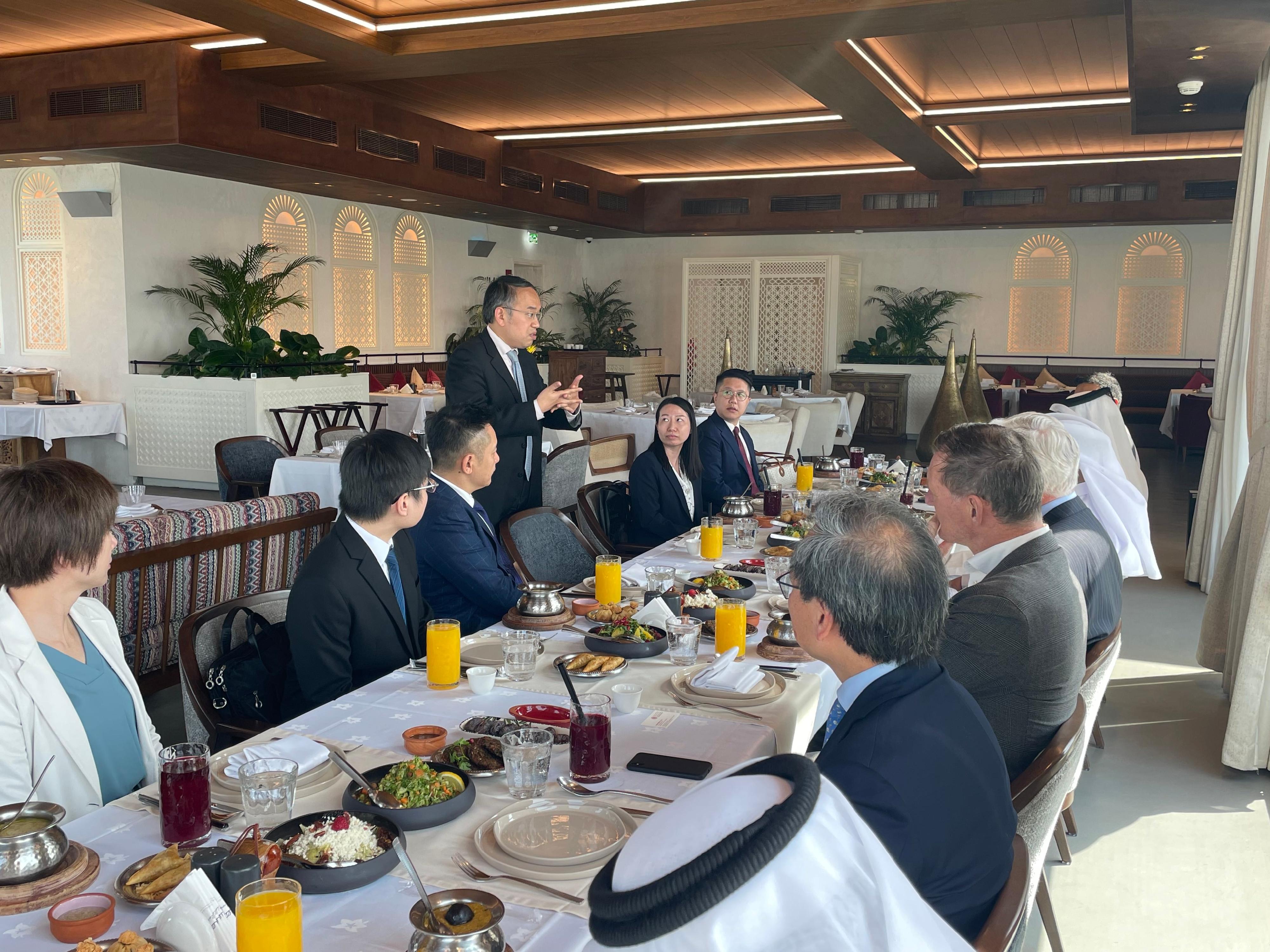 The Secretary for Financial Services and the Treasury, Mr Christopher Hui, continued his visit to Qatar. Photo shows Mr Hui (fourth left) speaking at the luncheon hosted by the Qatar Financial Centre in Doha today (September 21).
