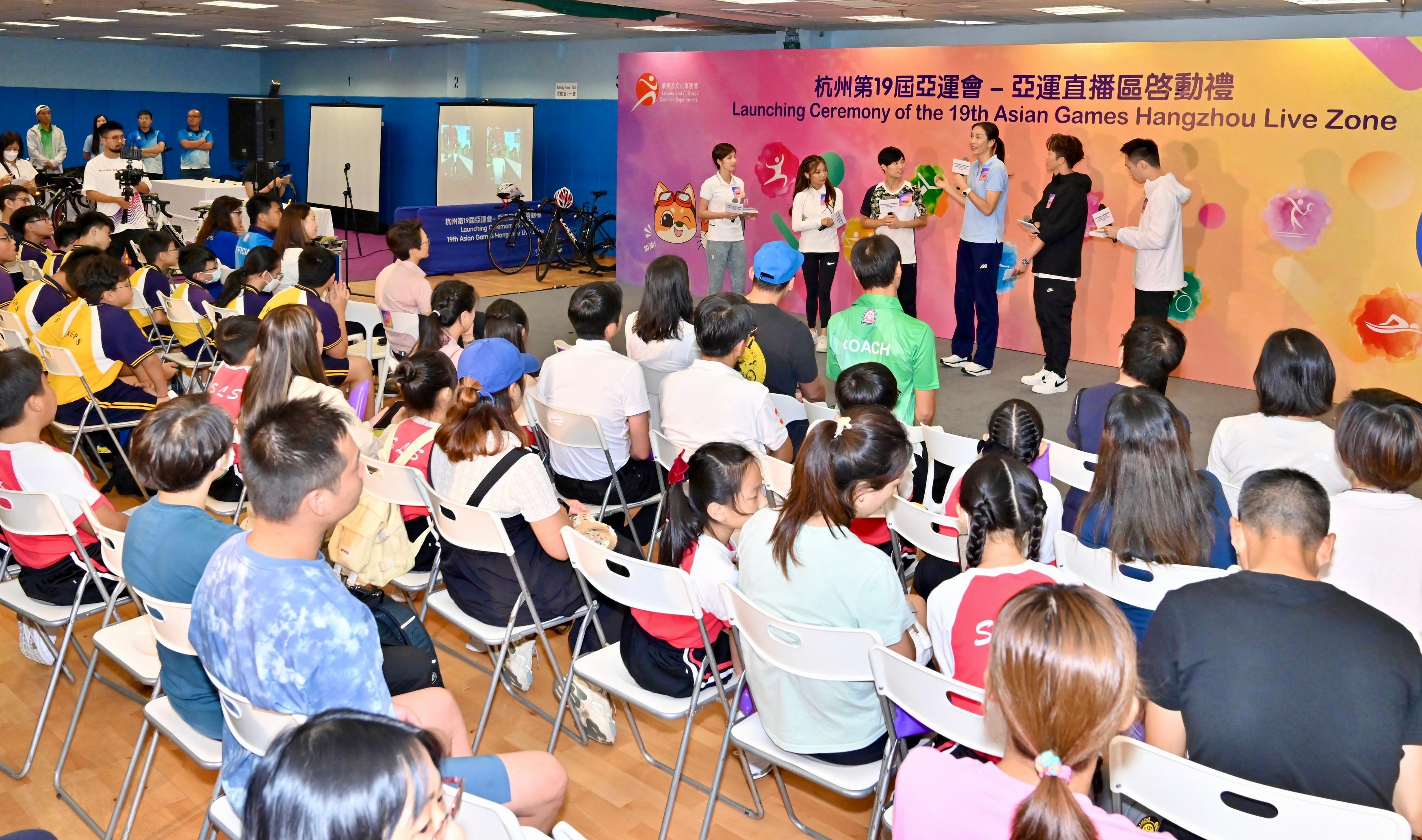 The Leisure and Cultural Services Department held the "Launching Ceremony of the 19th Asian Games Hangzhou Live Zone" at the Secondary Hall of the Kowloon Park Sports Centre today (September 23). Photo shows former China women’s volleyball team captain Sun Yue (third right) speaking at the sharing session.