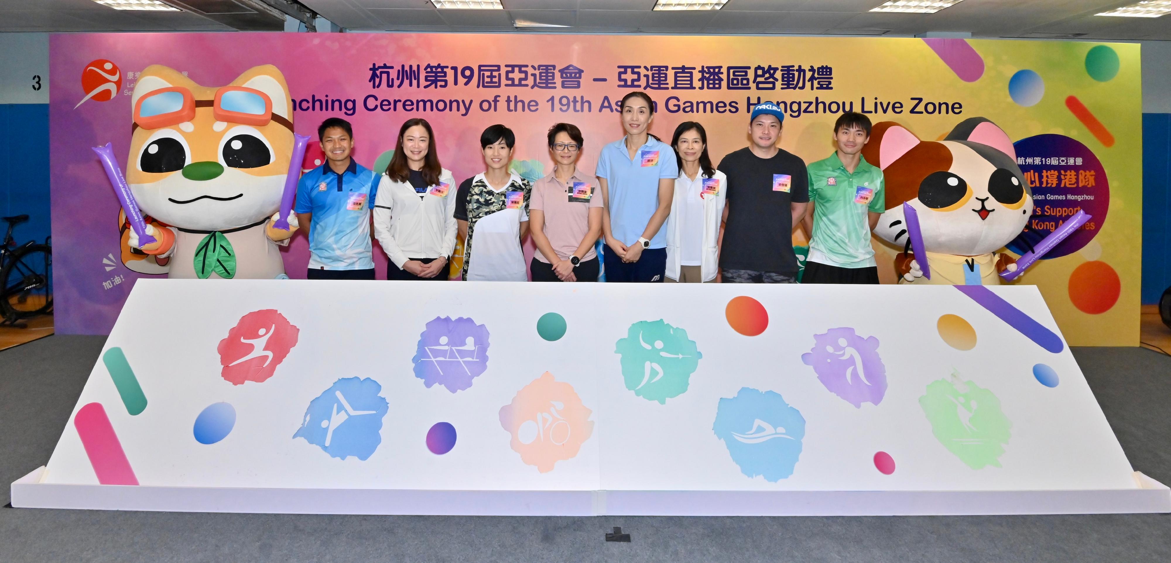 The Leisure and Cultural Services Department held the "Launching Ceremony of the 19th Asian Games Hangzhou Live Zone" at the Secondary Hall of the Kowloon Park Sports Centre today (September 23). Photo shows the Acting Director of Leisure and Cultural Services, Miss Winnie Chui (fourth left); the Assistant Director of Leisure and Cultural Services (Leisure Services)2, Ms Olivia Cheung (third right); former China women’s volleyball team captain Sun Yue (fourth right); badminton athlete Yip Pui-yin (third left); former rowing athlete Lee Ka-man (second left); former rowing athlete Leung Chun-shek (second right); former cycling athlete Leung Chi-yin (first left), and former cycling athlete Chau Dor-ming (first right), officiating at the ceremony.