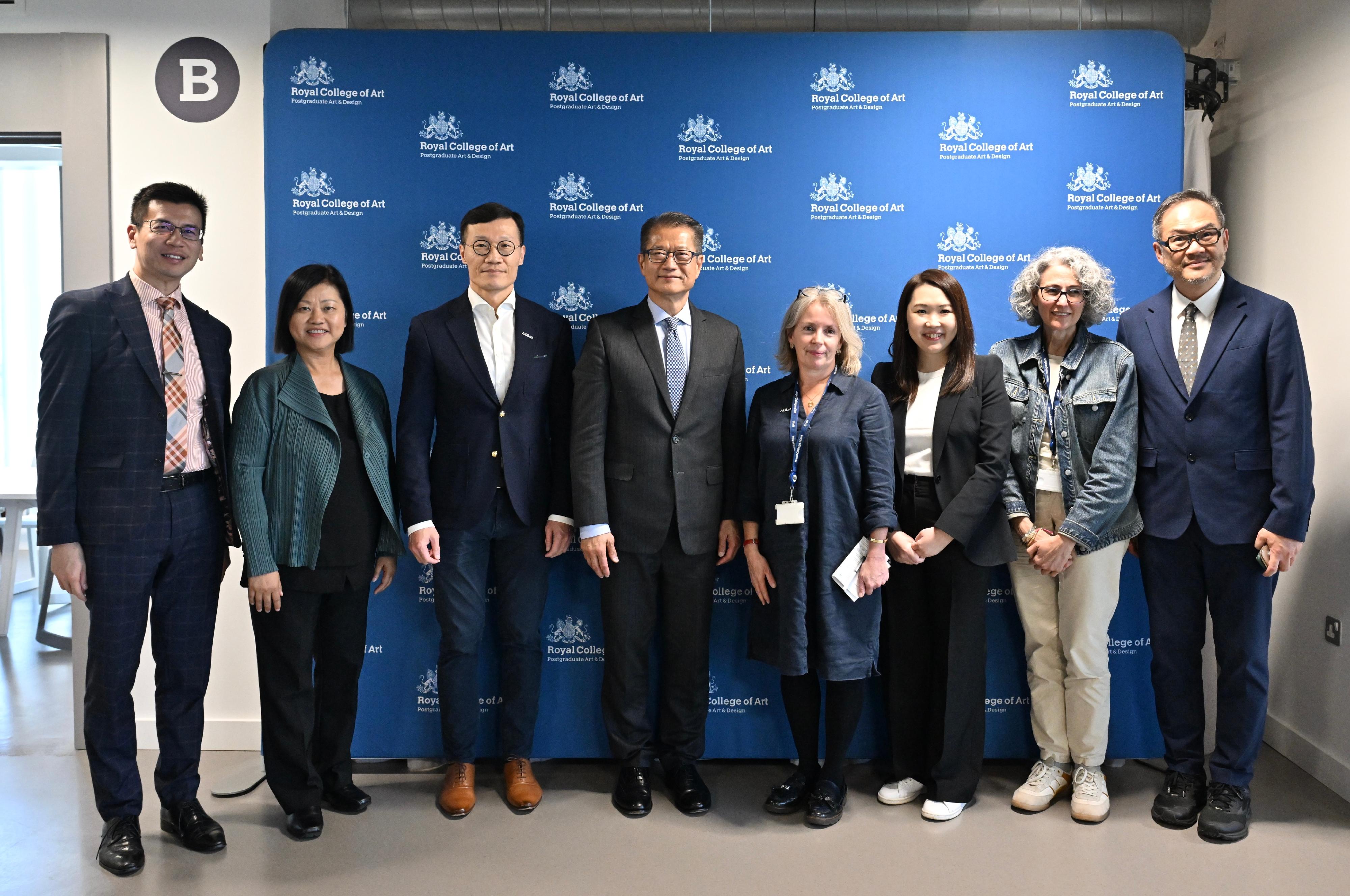 The Financial Secretary, Mr Paul Chan, continued his visit to London, the UK yesterday (September 22, London time), and visited the Royal College of Art (RCA). The Hong Kong Polytechnic University and the RCA jointly established the Laboratory for Artificial Intelligence in Design (AiDLab) in 2021. Photo shows Mr Chan (fourth left) with the Director of Research and Innovation of RCA, Dr Emma Wakelin (fourth right); Centre Director of AiDLab, Professor Calvin Wong (third left); and Centre Assistant Director of AiDLab, Professor Jeanne Tan (third right) in a group photo.  