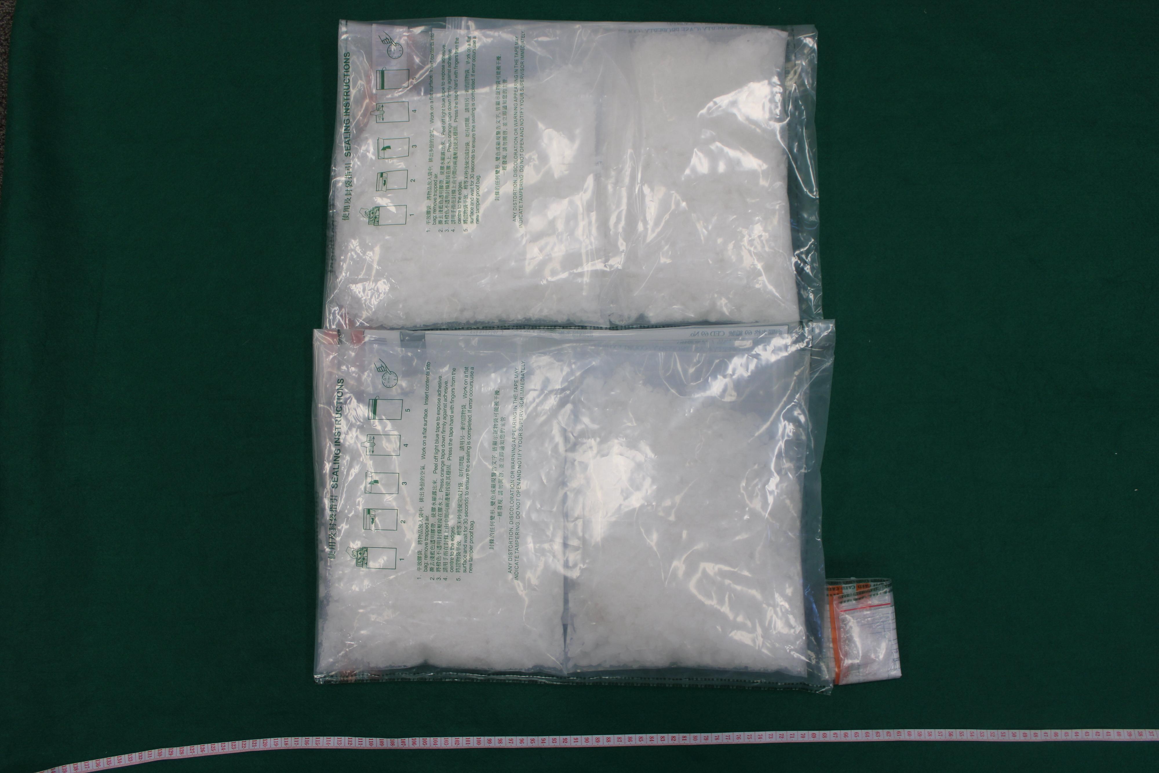 Hong Kong Customs detected two drug trafficking cases yesterday (September 22) at Tsuen Wan and Hong Kong International Airport. About 4 kilograms of suspected ketamine and about 940 grams of suspected cocaine with a total estimated market value of about $3 million were seized.  Photo shows the suspected ketamine seized in the first case. 