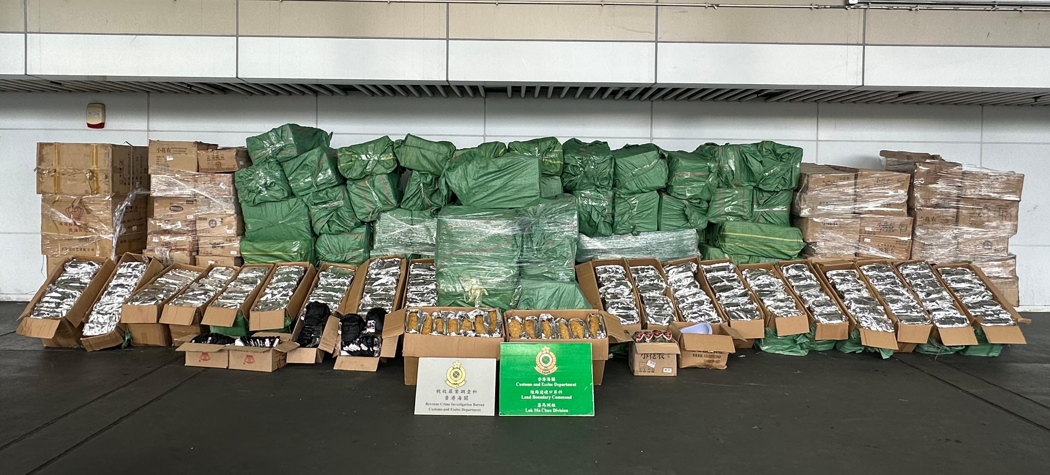 Hong Kong Customs today (September 23) detected a large-scale duty-not-paid manufactured tobacco smuggling case at the Lok Ma Chau Control Point and seized about 3 100 kilograms of suspected duty-not-paid manufactured tobacco with an estimated market value of about $16 million and a duty potential of about $9.5 million. Photo shows the suspected duty-not-paid cigarettes seized.
