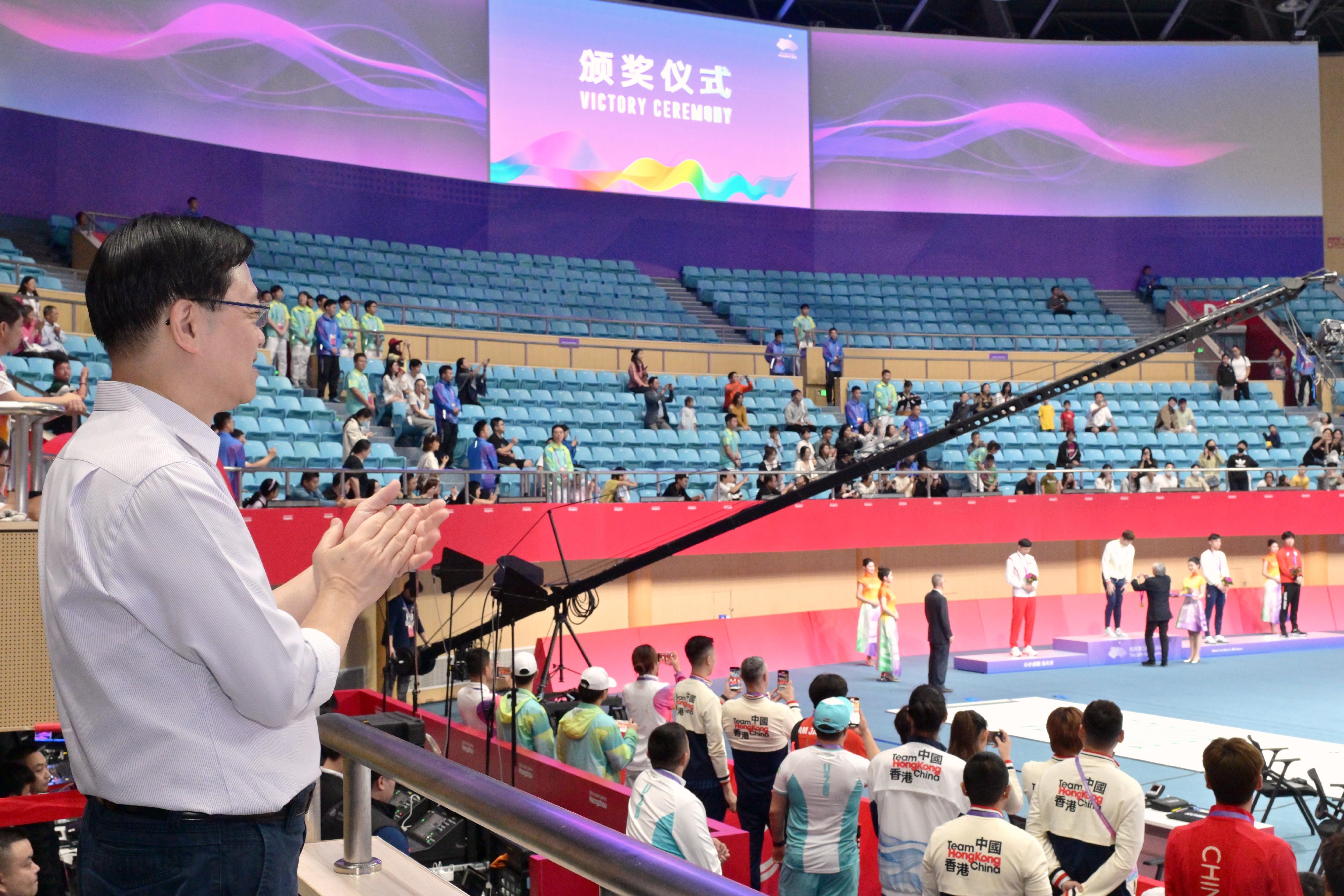 The Chief Executive, Mr John Lee, led a Hong Kong Special Administrative Region Government delegation to Hangzhou and continued his visit programme on September 24. Photo shows Mr Lee at the Victory Ceremony of the Men's Foil Individual at the 19th Asian Games Hangzhou.