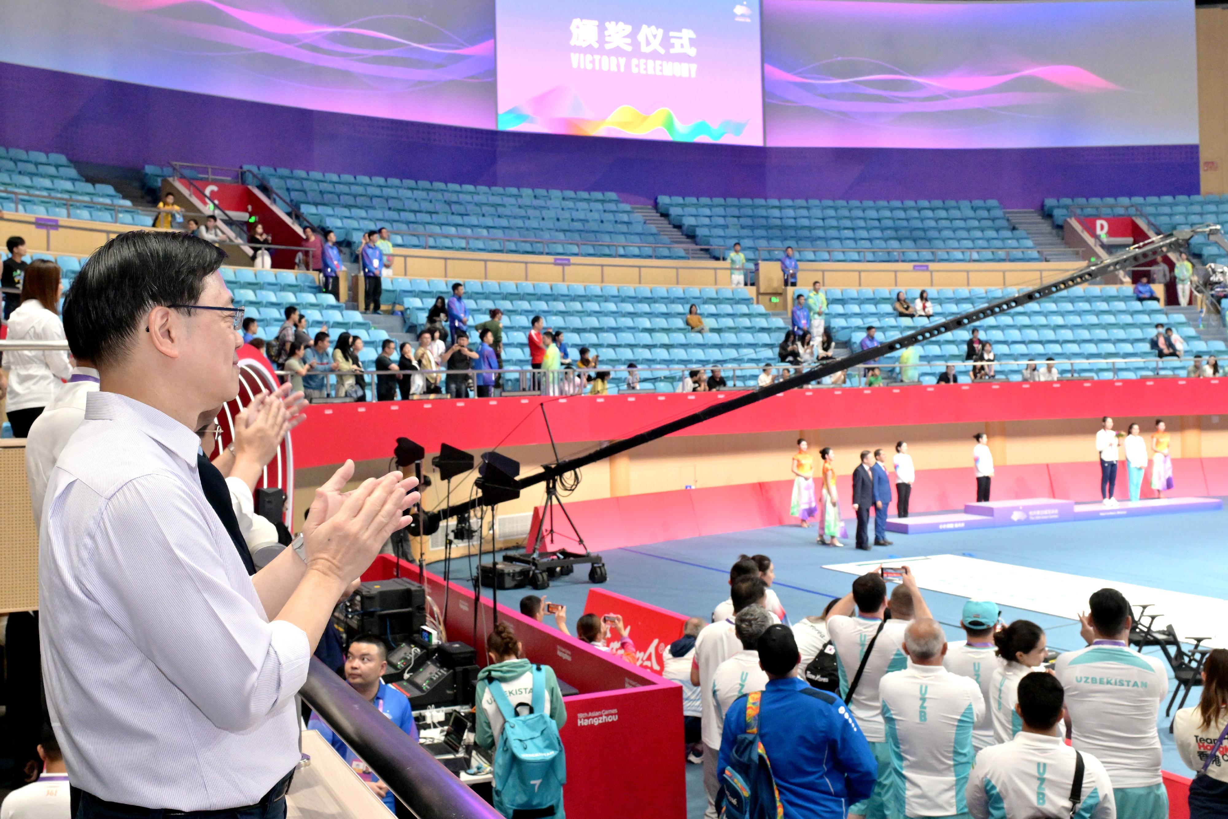 The Chief Executive, Mr John Lee, led a Hong Kong Special Administrative Region Government delegation to Hangzhou and continued his visit programme on September 24. Photo shows Mr Lee at the Victory Ceremony of the Women's Épée Individual at the 19th Asian Games Hangzhou.

