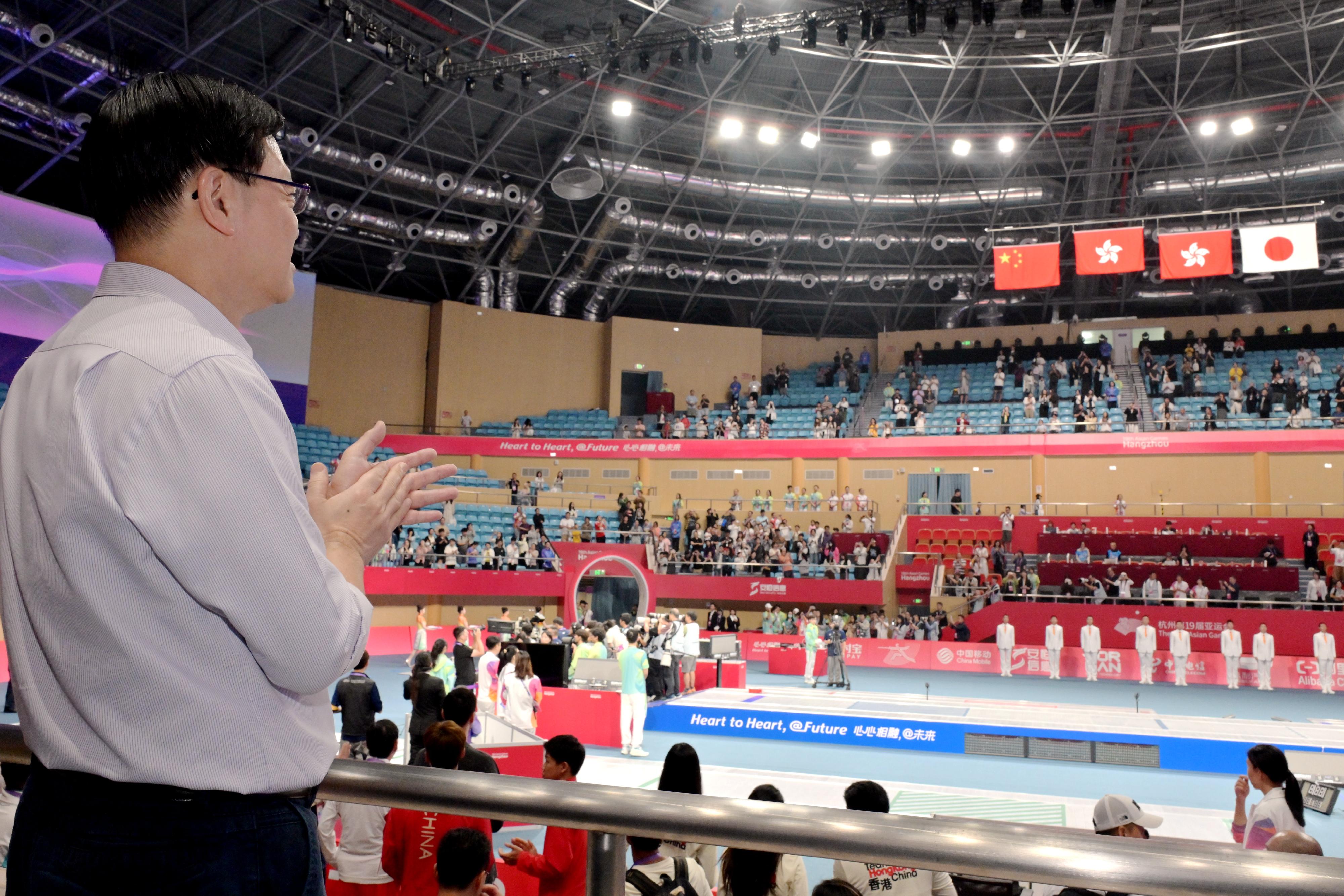 The Chief Executive, Mr John Lee, led a Hong Kong Special Administrative Region Government delegation to Hangzhou and continued his visit programme on September 24. Photo shows Mr Lee at the flag raising ceremony of the Victory Ceremony of the Men's Foil Individual at the 19th Asian Games Hangzhou.