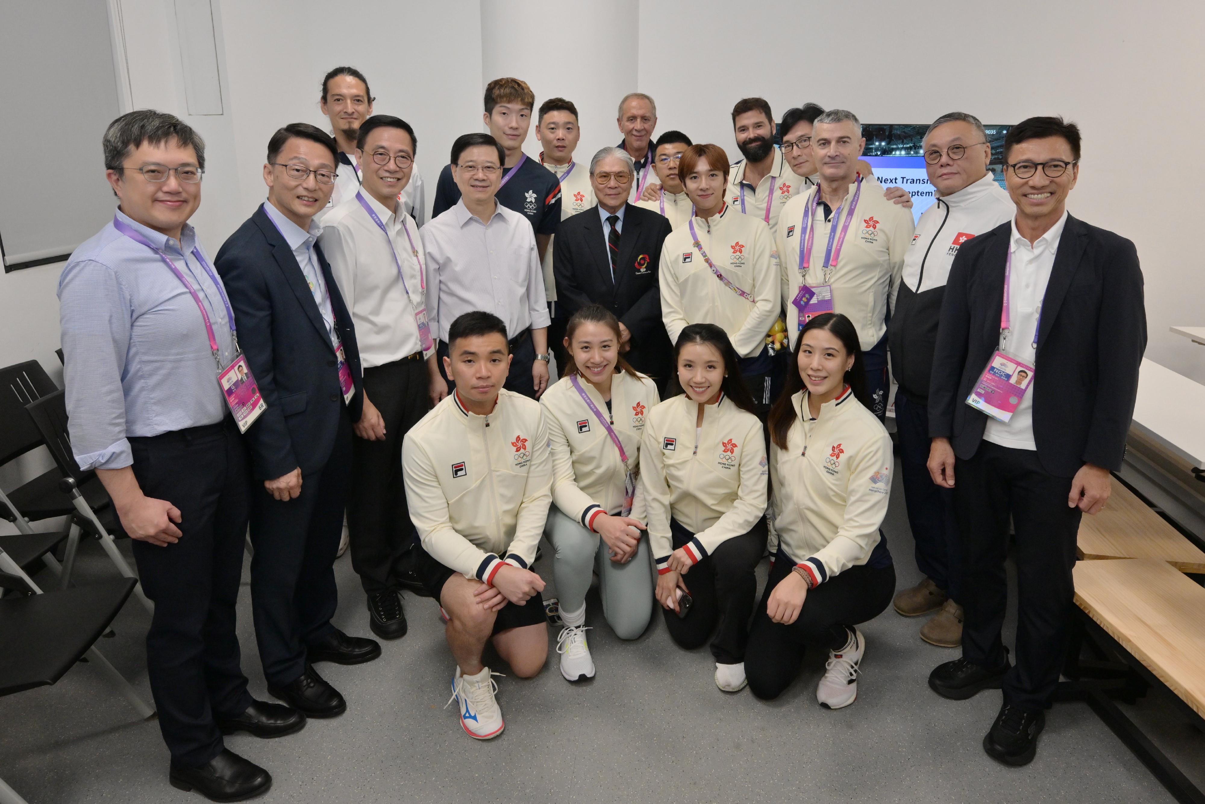 The Chief Executive, Mr John Lee, led a Hong Kong Special Administrative Region Government delegation to Hangzhou and continued his visit programme on September 24. Photo shows Mr Lee (second row, fourth left); the Secretary for Culture, Sports and Tourism, Mr Kevin Yeung (second row, third left); the Director of Leisure and Cultural Services, Mr Vincent Liu (second row, second left); the Commissioner for Sports in the Culture, Sports and Tourism Bureau, Mr Sam Wong (second row, first right); and the President of the Sports Federation & Olympic Committee of Hong Kong, China, Mr Timothy Fok (second row, fifth left), with Hong Kong fencing athletes.