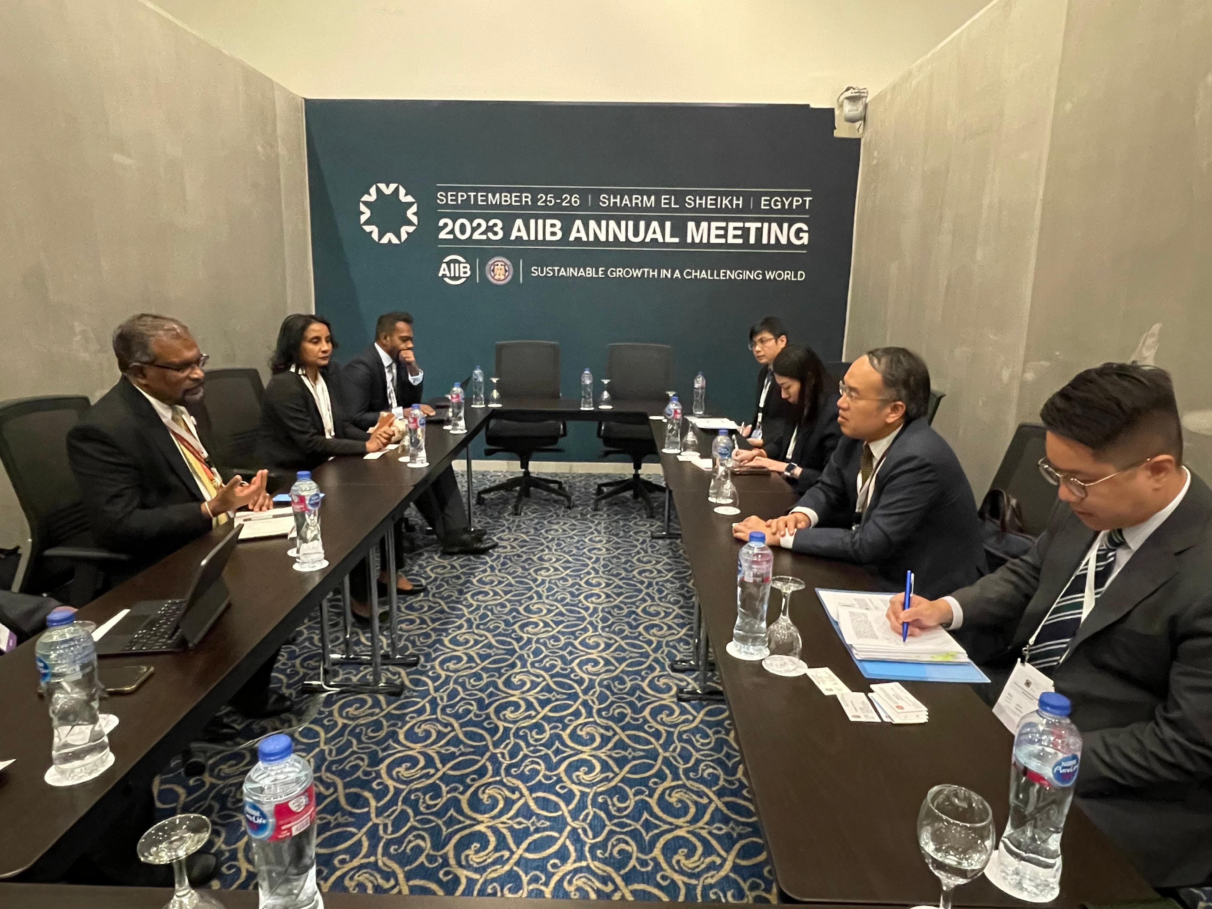 The Secretary for Financial Services and the Treasury, Mr Christopher Hui, continues his visit in Egypt. Photo shows Mr Hui (second right) meeting with the Secretary to the Treasury, Ministry of Finance of Sri Lanka, Mr K M Mahinda Siriwardana (first left), on the sidelines of the Eighth Annual Meeting of the Board of Governors of the Asian Infrastructure Investment Bank in Sharm El Sheikh on September 25 (Sharm El Sheikh time).
