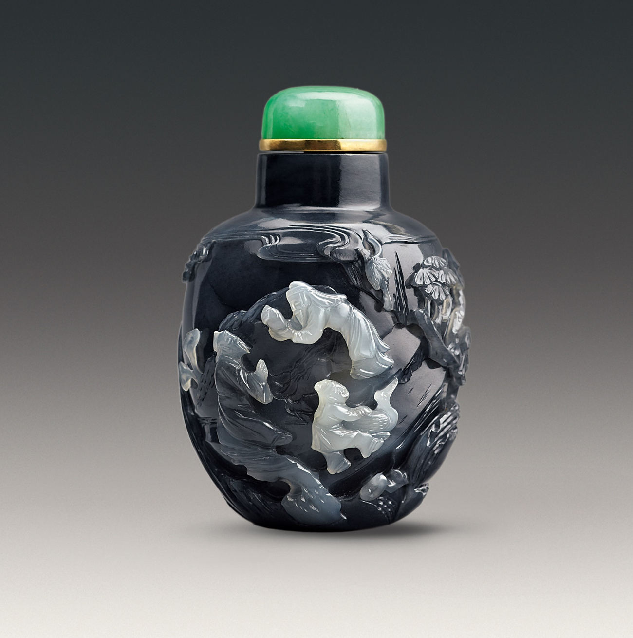 The Hong Kong Museum of Art today (September 28) announced that Christopher and Josephine Sin generously donated nearly 500 pieces of Chinese snuff bottles from the Fuyun Xuan Collection of Chinese Snuff Bottles for the museum's permanent collection. Picture shows the newly donated black jade snuff bottle with scholars and peach design. The artisan's unique craftsmanship is amply reflected through the delicate relief carving incorporating the natural colours and texture of the dark jade into its composition. 