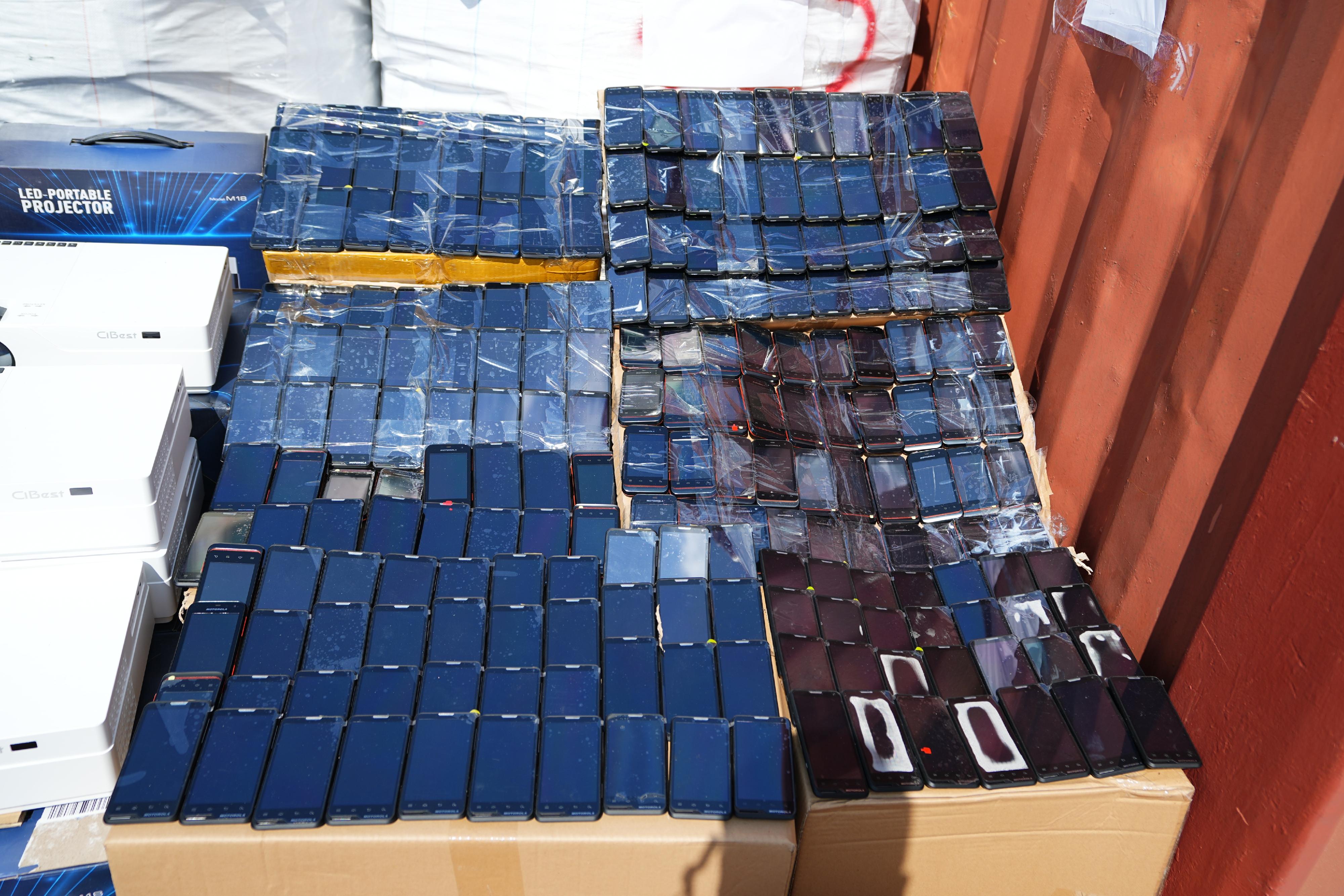 Hong Kong Customs mounted a special operation codenamed "Wave Breaker" from August to September and detected four suspected smuggling cases involving ocean-going vessels and two suspected smuggling cases involving river trade vessels. A large batch of suspected smuggled goods with a total estimated market value of about $100 million was seized. Photo shows some of the mobile phones seized.

