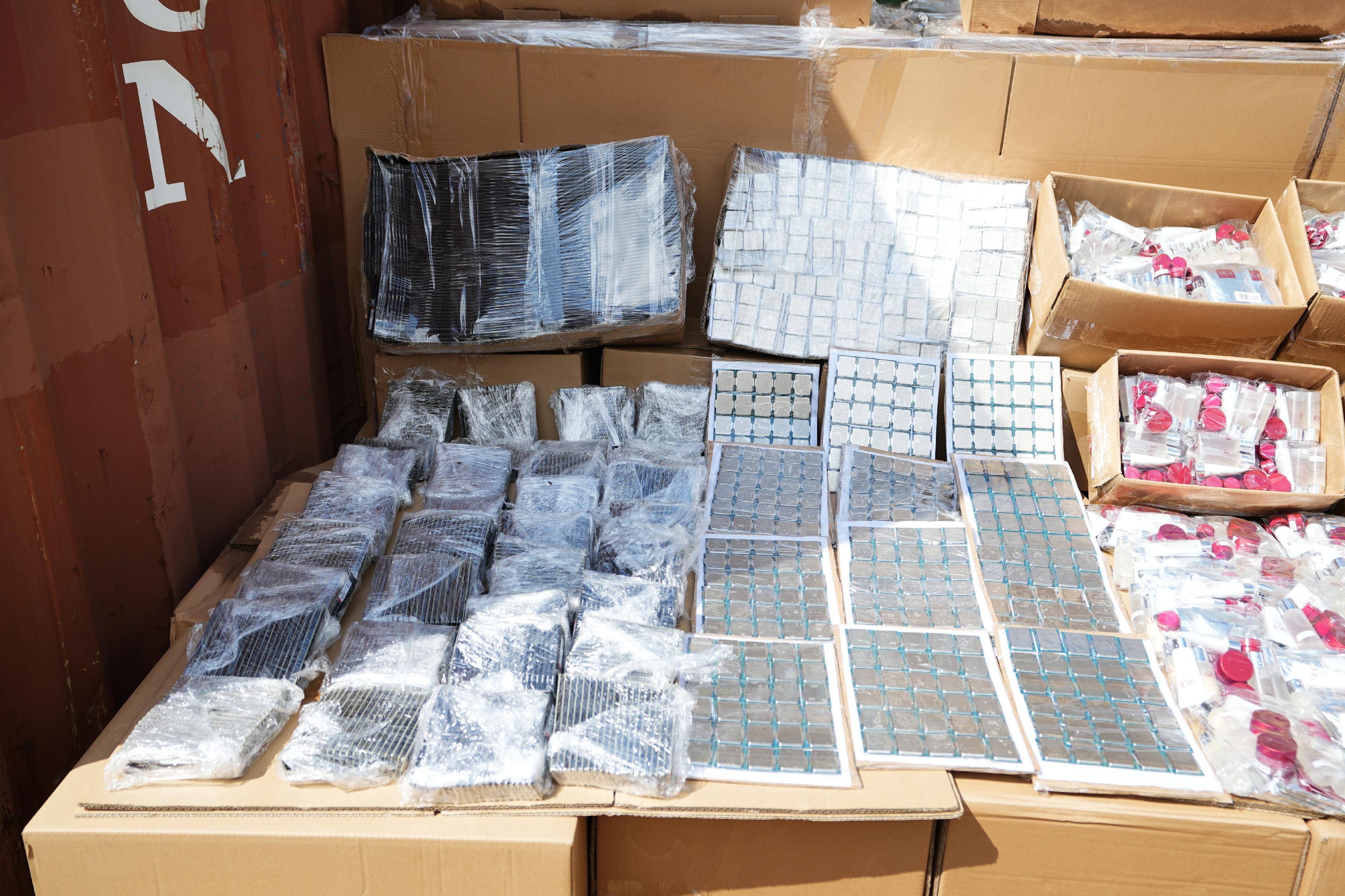 Hong Kong Customs mounted a special operation codenamed "Wave Breaker" from August to September and detected four suspected smuggling cases involving ocean-going vessels and two suspected smuggling cases involving river trade vessels. A large batch of suspected smuggled goods with a total estimated market value of about $100 million was seized. Photo shows some of the electronic parts seized.

