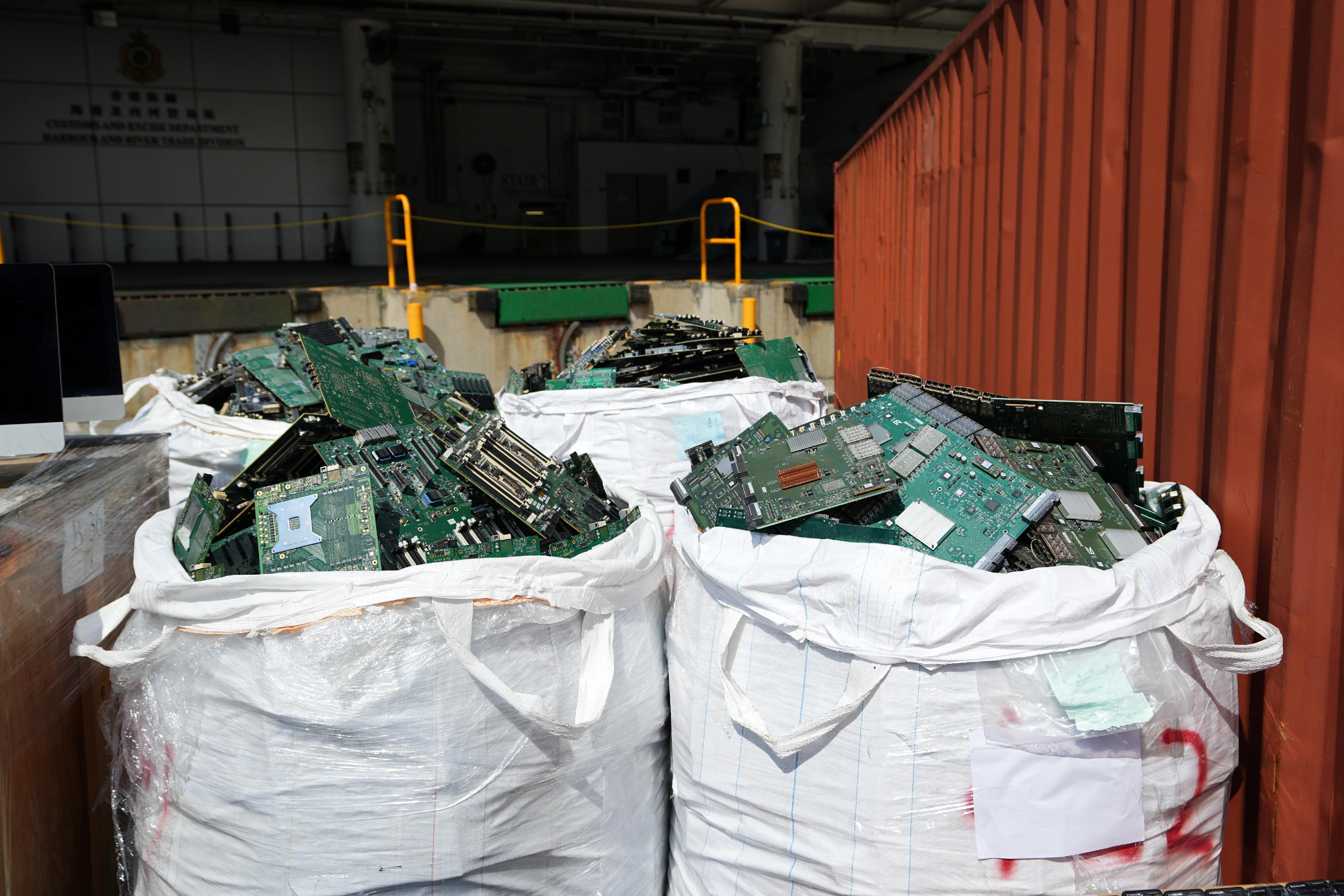 Hong Kong Customs mounted a special operation codenamed "Wave Breaker" from August to September and detected four suspected smuggling cases involving ocean-going vessels and two suspected smuggling cases involving river trade vessels. A large batch of suspected smuggled goods with a total estimated market value of about $100 million was seized. Photo shows some of the electronic wastes seized.
