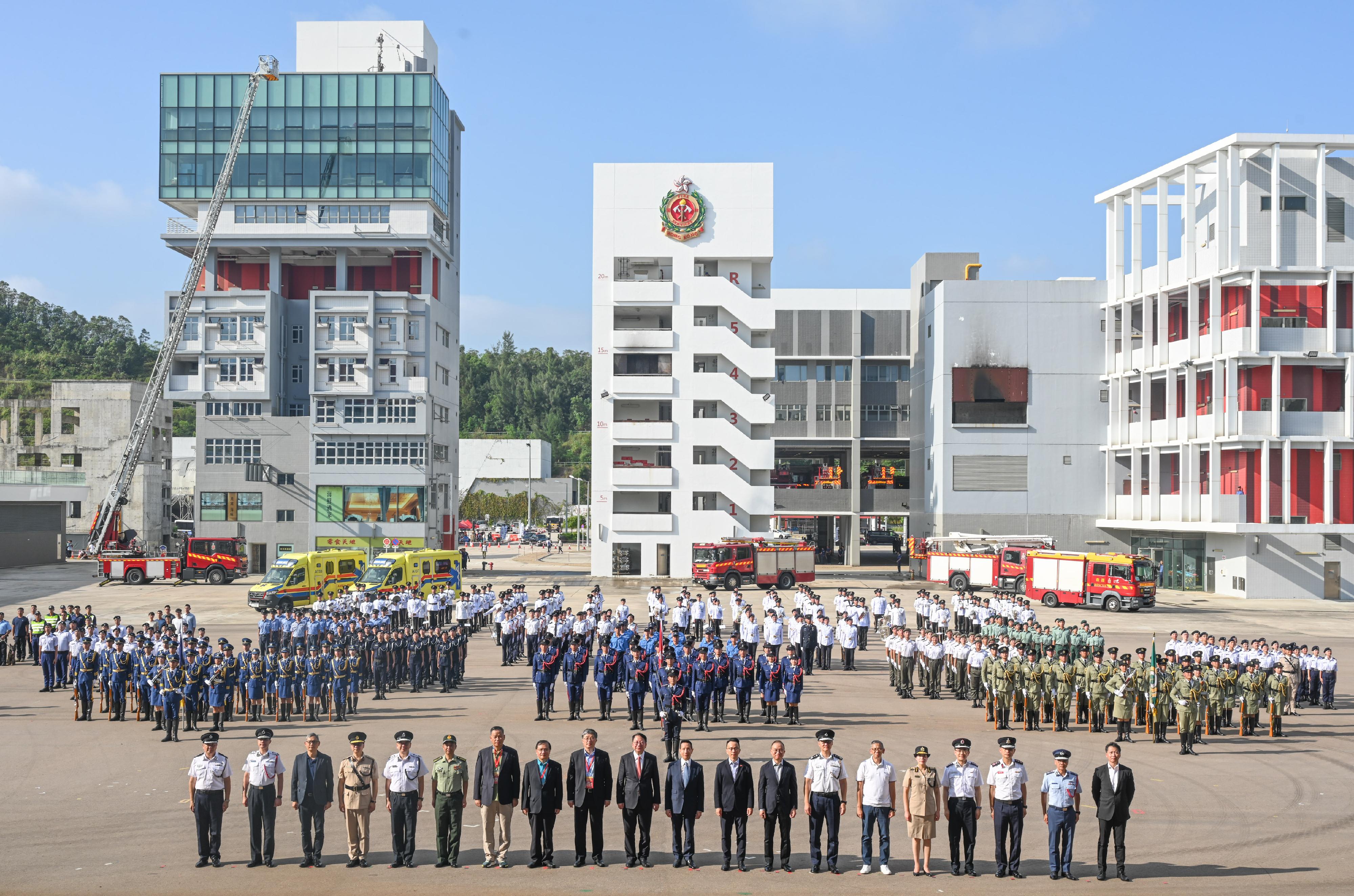 The Security Bureau led its disciplined services and auxiliary services,together with youth uniformed groups,to hold Parade by Disciplined Services and Youth Groups cum Carnival for Celebrating the 74th Anniversary of the Founding of the People's Republic of China (PRC) today(October 1) to celebrate the National Day with public.Photo shows (front row from left) Commandant of Hong Kong Auxiliary Police Force,Mr Yang Joe-tsi;Commissioner of Civil Aid Service,Mr Lo Yan-Lai;Under Secretary for Security,Mr Michael Cheuk;Commissioner of Correctional Services,Mr Wong Kwok-hing;Director of Immigration,Mr Benson Kwok;People’s Liberation Army Hong Kong Garrison Deputy Chief of Staff Mr Zhang Jun;Director of liaison office of Office for Safeguarding National Security of the CPG in the HKSAR,Mr Deng Jianwei;Deputy Commissioner of the Office of the Commissioner of the Ministry of Foreign Affairs of the PRC in the HKSAR,Mr Fang Jianming;Deputy Director of Liaison Office of the CPG in the HKSAR,Mr Luo Yonggang;Chief Secretary for Administration, Mr Chan Kwok-ki;officiating guest Mr Tang Yat-sun;Permanent Secretary for Security,Mr Patrick Li;Secretary for Constitutional and Mainland Affairs,Mr Erick Tsang Kwok-wai;Commissioner of Police,Mr Siu Chak-yee;Independent Commission Against Corruption Commissioner,Mr Woo Ying-ming;Commissioner of Customs and Excise,Ms Louise Ho;Commissioner of Auxiliary Medical Service,Dr Ronald Lam;Director of Fire Services,Mr Andy Yeung;Controller of Government Flying Service, Captain West Wu,and Director of Broadcasting, Mr Eddie Cheung;and performers at event.