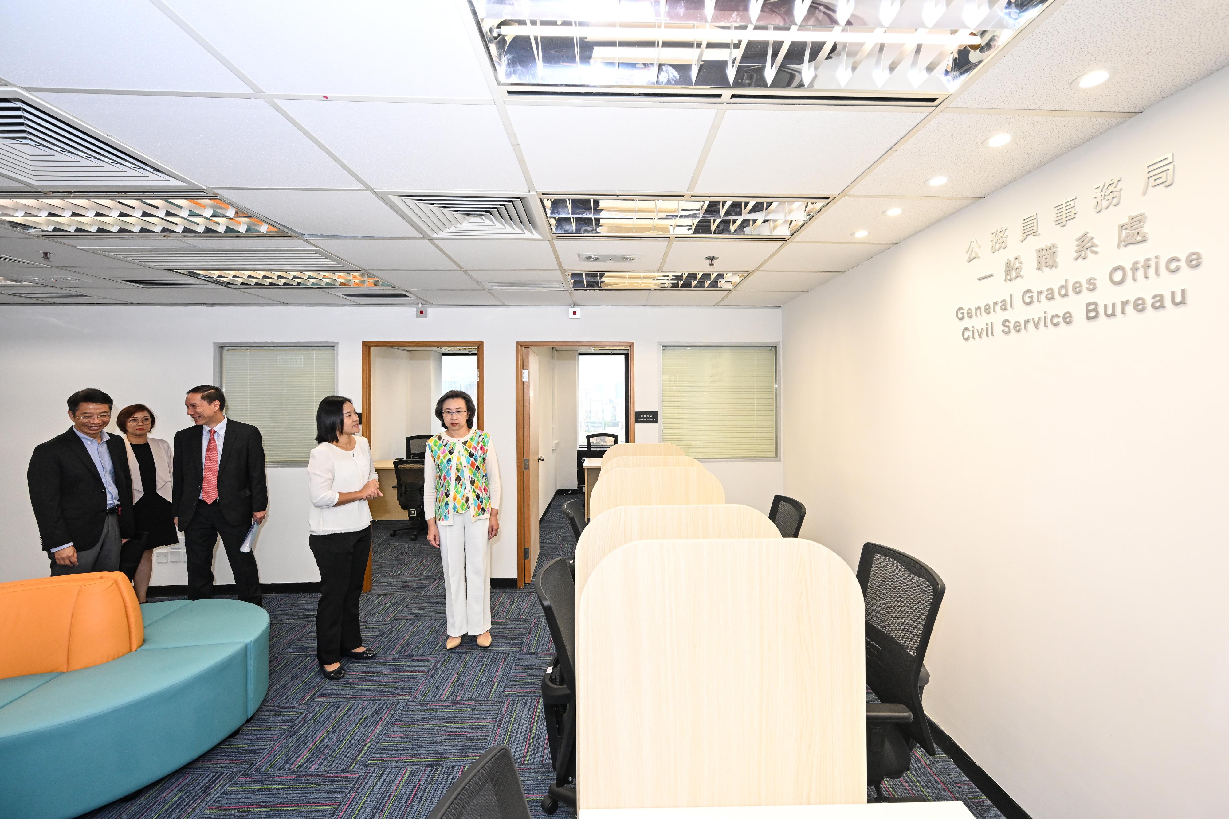 The Recruitment Centre, General Grades Office of the Civil Service Bureau officially commenced operation today (October 6) to conduct year-round recruitment for the posts of Assistant Clerical Officer, Clerical Assistant and Personal Secretary II. Photo shows the Secretary for the Civil Service, Mrs Ingrid Yeung (first right), visiting the interview area for eligible applicants to have their selection interviews.