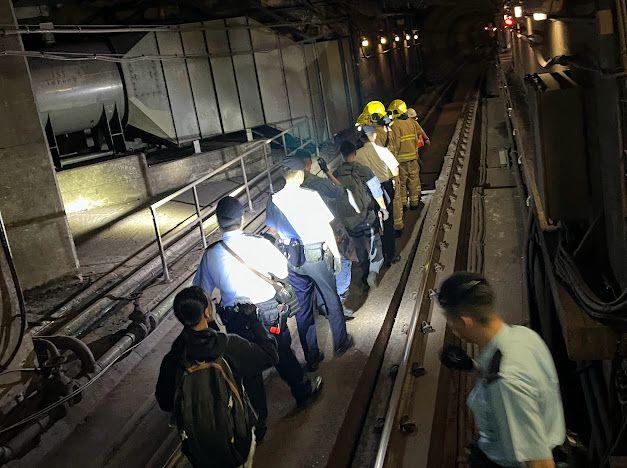 The Hong Kong Police Force, together with the MTR Corporation, the Fire Services Department, the Auxiliary Medical Service, St John Ambulance conducted an inter-departmental response exercise in the early hours today (October 14). Picture shows officers enter the tunnel for initial investigations and search for casualties.