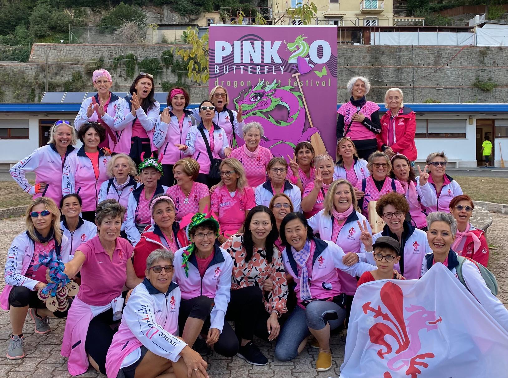 The Pink Butterfly Dragon Boat Festival, sponsored by the Hong Kong Economic and Trade Office in Brussels (HKETO, Brussels) for the first time, were held at the Castel Gandolfo Olympic lake near Rome in Italy on October 14 (Rome time). Photo shows Deputy Representative of the HKETO, Brussels Miss Fiona Li (front row, centre) with the winning team at the Pink Butterfly Dragon Boat Festival. 