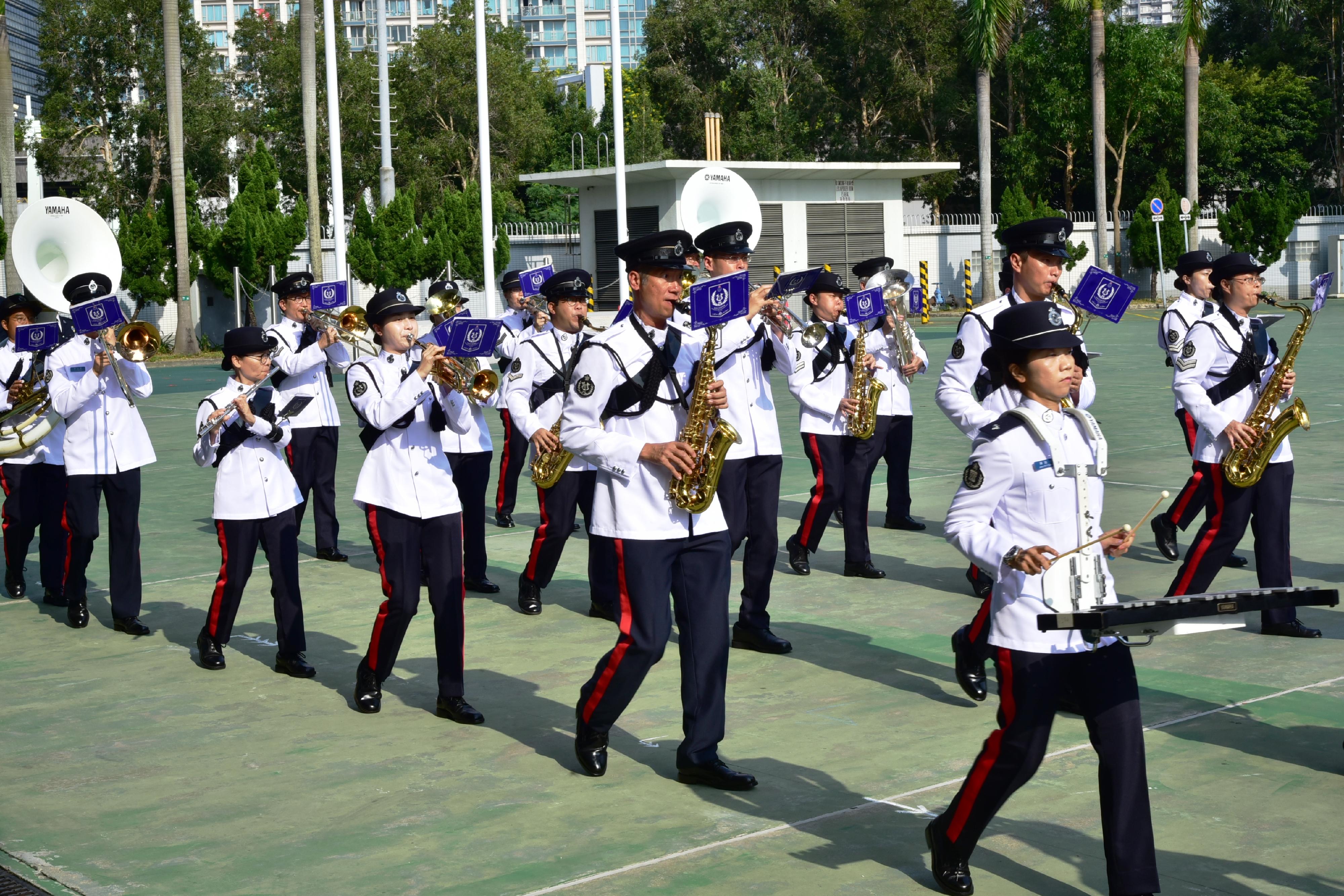The Civil Aid Service (CAS) held the 86th Recruits Passing-out Parade at its headquarters today (October 15). Photo shows the CAS Band performing.