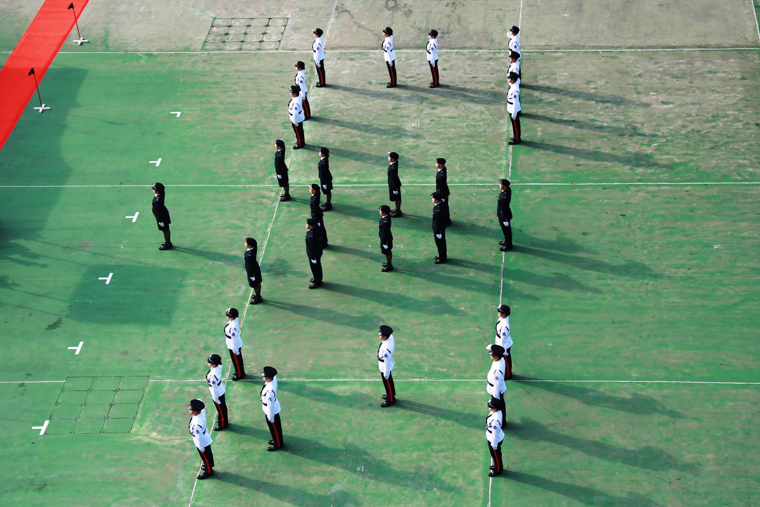 The Civil Aid Service (CAS) held the 86th Recruits Passing-out Parade at its headquarters today (October 15). Photo shows CAS Guards of Honour performing.