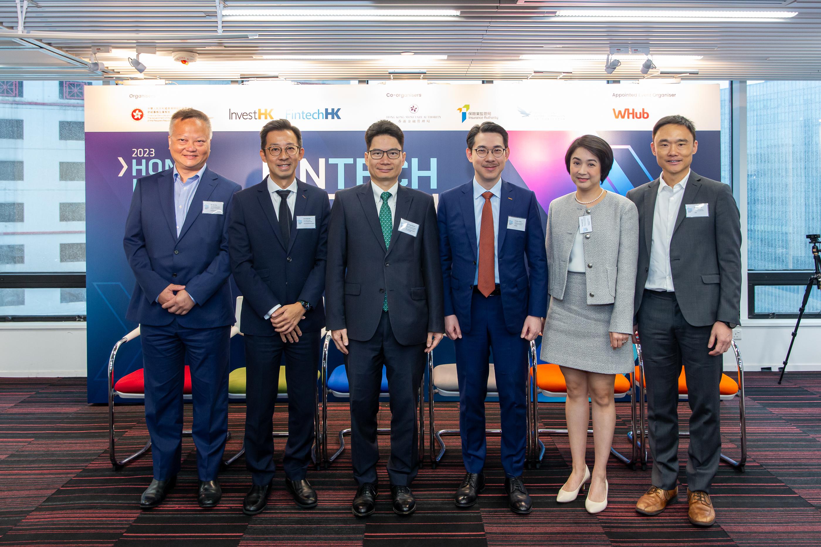Invest Hong Kong (InvestHK) today (October 18) announced details of Hong Kong FinTech Week 2023. Photo shows (from left) the Associate Director of the Policy and Development Division of the Insurance Authority, Mr Tony Chan; the Chief Fintech Officer, Fintech Facilitation Office of the Hong Kong Monetary Authority, Mr George Chou; the Acting Secretary for Financial Services and the Treasury, Mr Joseph Chan; the Acting Director-General of Investment Promotion of InvestHK, Dr Jimmy Chiang; the Director of Licensing and Head of Fintech Unit, Intermediaries, of the Securities and Futures Commission, Ms Elizabeth Wong; and the Senior Vice President, Innovation & Data Lab of Hong Kong Exchanges and Clearing Limited, Mr Andrew Loh, at today's announcement event.

