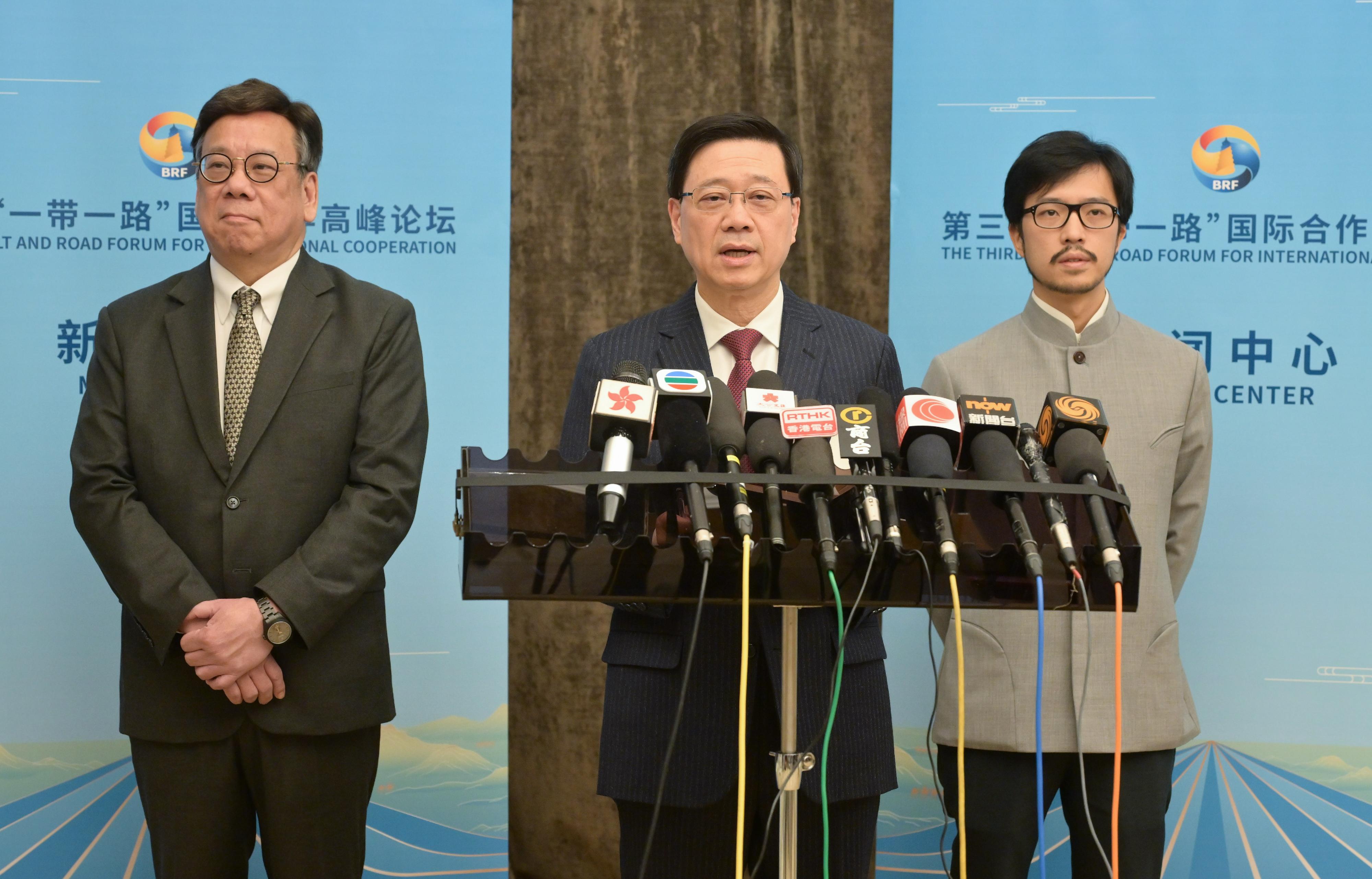 The Chief Executive, Mr John Lee, led a high-level Hong Kong Special Administrative Region delegation comprising senior government officials and members of various sectors to participate in the third Belt and Road Forum for International Cooperation. Photo shows Mr Lee (centre), together with the Secretary for Commerce and Economic Development, Mr Algernon Yau (left), and the Commissioner for Belt and Road, Mr Nicholas Ho (right), meeting the media in Beijing today (October 19).

