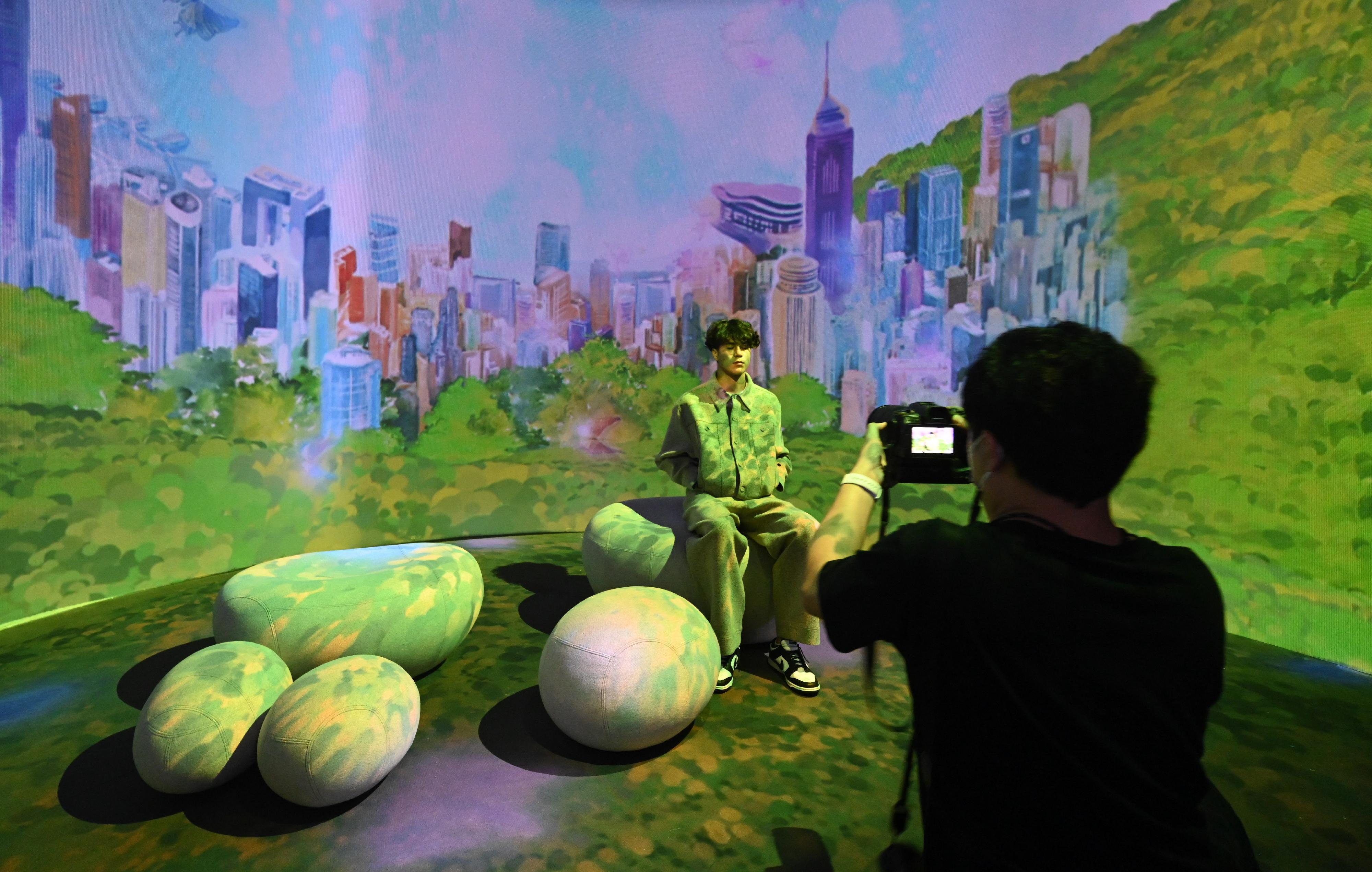 The "Immersive Hong Kong" roving exhibition, which showcases Hong Kong's unique strengths, advantages and opportunities with art technology, was launched in Bangkok, Thailand, today (October 20) as part of a promotional campaign in Association of Southeast Asian Nations countries. Photo shows an art projection with the theme of "Diversity and Greenery" at the exhibition.