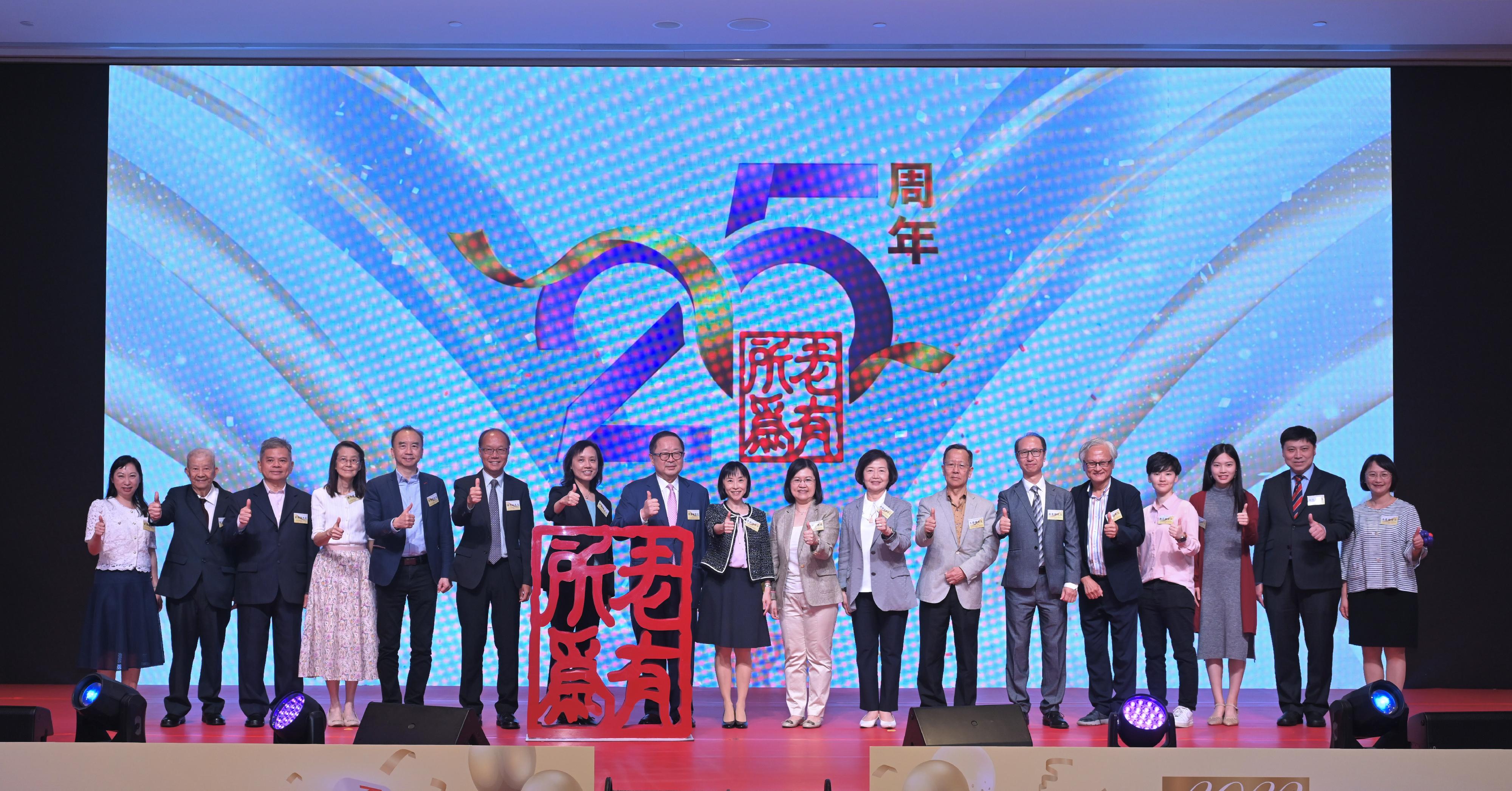 The Social Welfare Department today (November 1) held the 2023 Award Presentation Ceremony of the Opportunities for the Elderly Project (OEP). Photo shows the Director of Social Welfare, Miss Charmaine Lee (ninth left); the Chairman of the Elderly Commission, Dr Donald Li (eighth left); and the Chairman of the OEP Advisory Committee, Professor Diana Lee (ninth right), joined by other guests in celebrating the 25th anniversary of the implementation of the OEP at the ceremony.