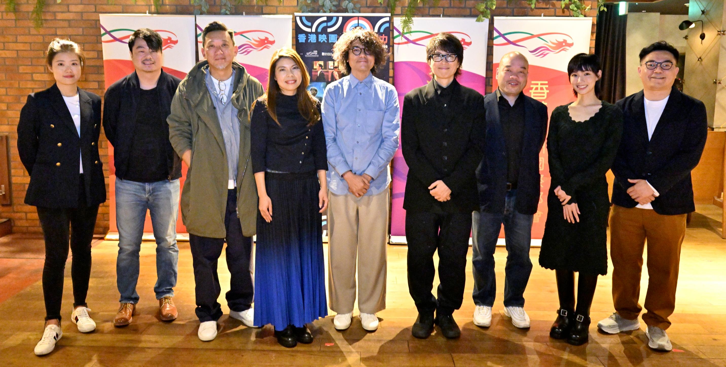 The Hong Kong Economic and Trade Office in Tokyo and the Hong Kong International Film Festival Society are jointly presenting a Hong Kong film festival "Making Waves - Navigators of Hong Kong Cinema" in Tokyo, Japan, showcasing a selection of new and restored Hong Kong films from today (November 2) to November 5. Photo shows (from left) "Where the Wind Blows" screenwriter Sun Fei and director Philip Yung; "Mad Fate" director Soi Cheang; the Principal Hong Kong Economic and Trade Representative (Tokyo), Miss Winsome Au; "Mad Fate" actor Gordon Lam; "A Guilty Conscience" actor Dayo Wong and director Jack Ng; and "Once in a Blue Moon" actress Gladys Li and director Andy Lo at the opening reception today.