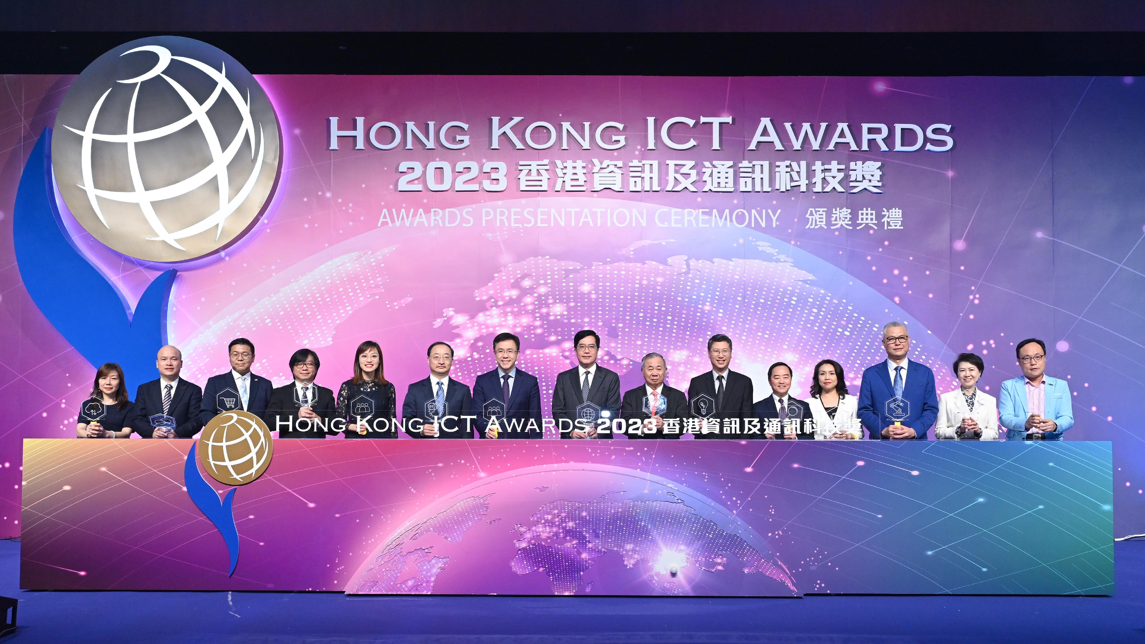 The Deputy Financial Secretary, Mr Michael Wong, attended the Hong Kong ICT Awards 2023 Awards Presentation Ceremony this evening (November 3). Photo shows (from fifth left) the Under Secretary for Innovation, Technology and Industry, Ms Lillian Cheong; the Director-General of the Department of Youth Affairs of the Liaison Office of the Central People's Government in the Hong Kong Special Administrative Region, Mr Zhang Zhihua;  the Secretary for Innovation, Technology and Industry, Professor Sun Dong; Mr Wong; the Chairman of the Hong Kong ICT Awards 2023 Grand Judging Panel, the President of City University of Hong Kong, Professor Freddy Boey; the Permanent Secretary for Innovation, Technology and Industry, Mr Eddie Mak; the Government Chief Information Officer, Mr Tony Wong, and other guests at the ceremony.
