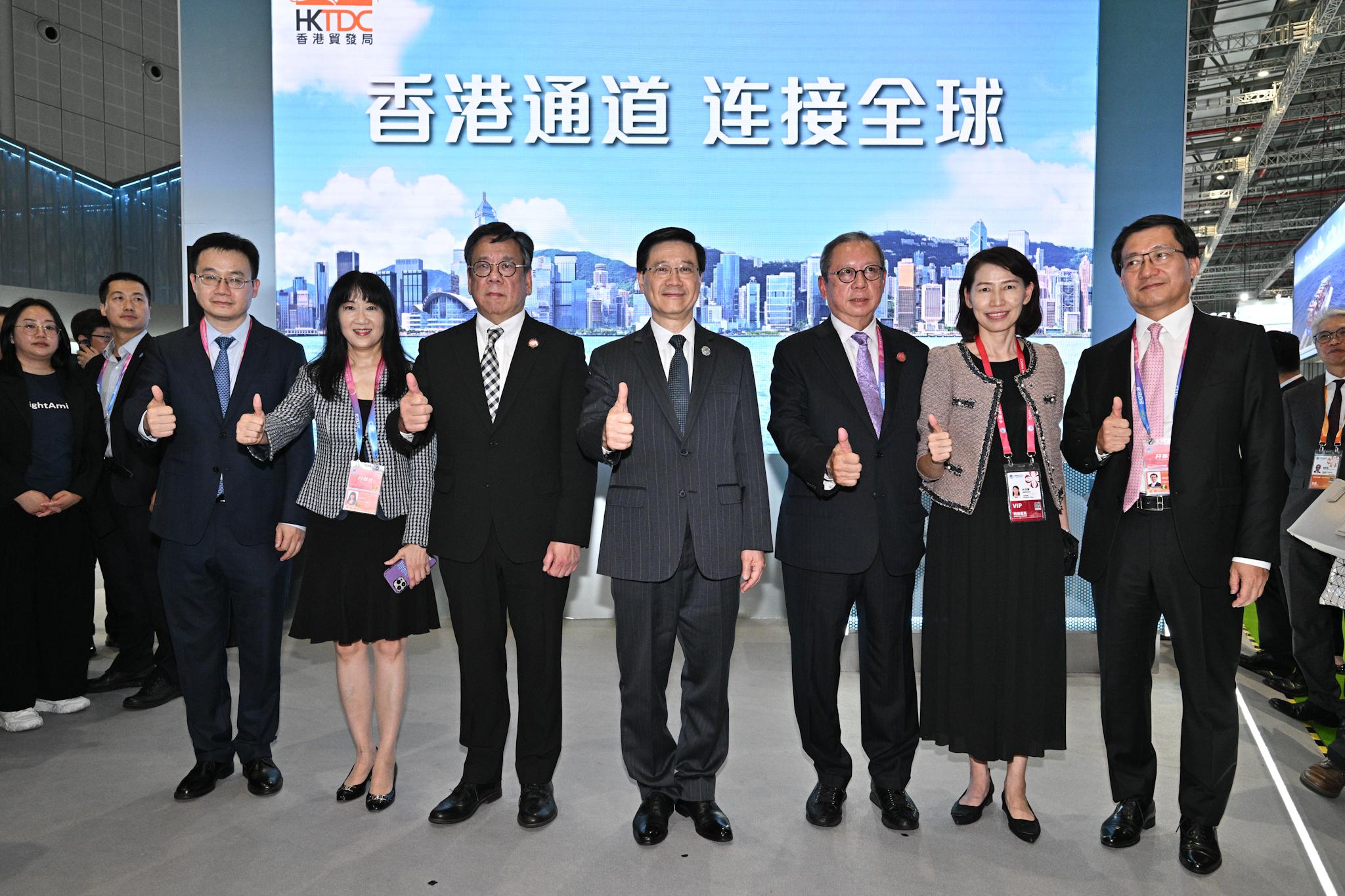 The Chief Executive, Mr John Lee, visited the Hong Kong Exhibition Area of the sixth China International Import Expo in Shanghai today (November 5). Photo shows (from second left) the Executive Director of the Hong Kong Trade Development Council (HKTDC), Ms Margaret Fong; the Secretary for Commerce and Economic Development, Mr Algernon Yau; Mr Lee; the Chairman of the HKTDC, Dr Peter Lam; the Director of the Chief Executive's Office, Ms Carol Yip; and the Chief Executive Officer of the Airport Authority Hong Kong, Mr Fred Lam, at the Hong Kong Service Pavilion.