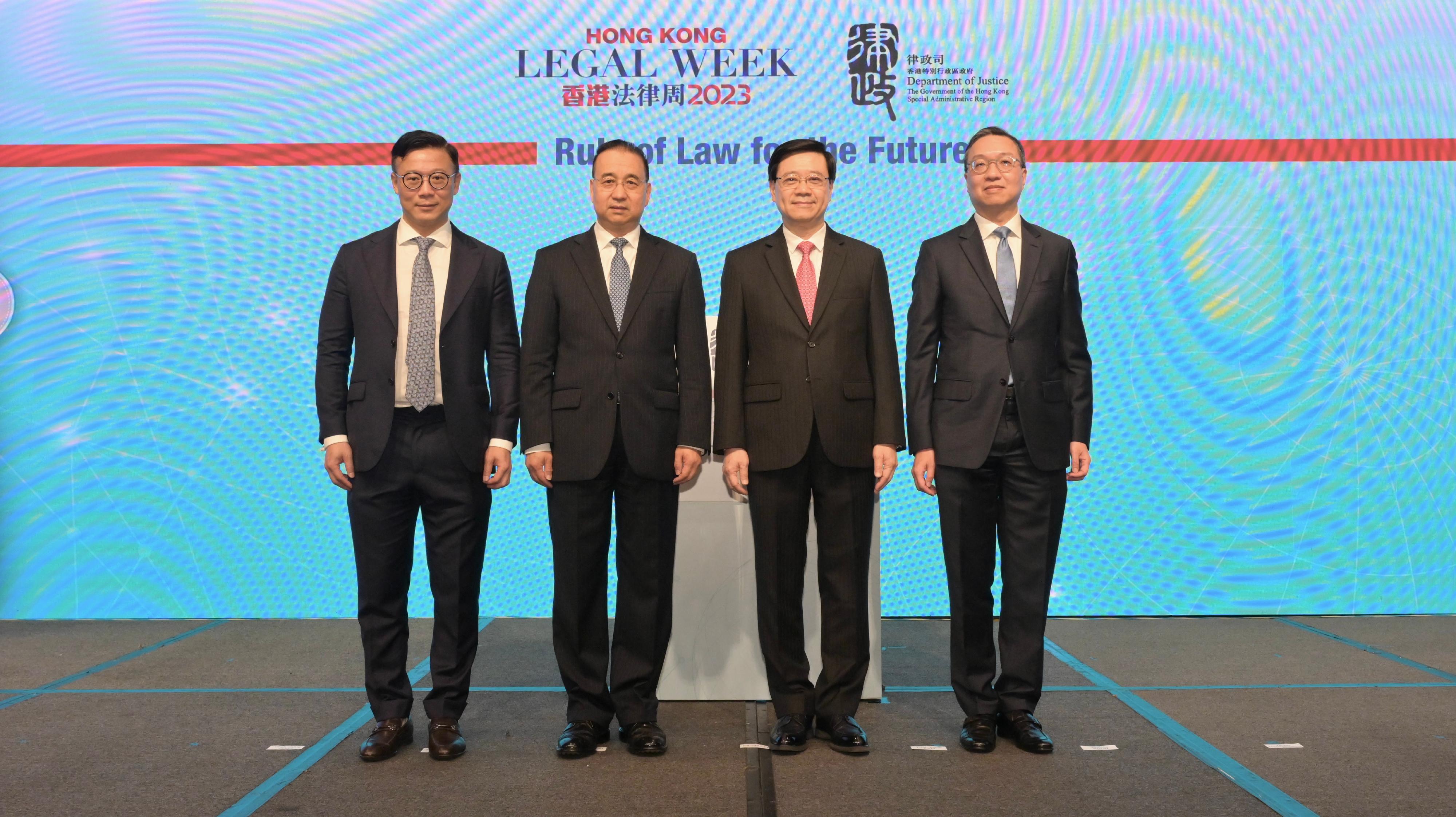 The Chief Executive, Mr John Lee, attended the Hong Kong Legal Week 2023: Rule of Law for the Future this morning (November 10). Photo shows (from left) the Deputy Secretary for Justice, Mr Cheung Kwok-kwan; Deputy Director of the Liaison Office of the Central People's Government in the Hong Kong Special Administrative Region Mr Liu Guangyuan; Mr Lee; and the Secretary for Justice, Mr Paul Lam, SC, at the event.