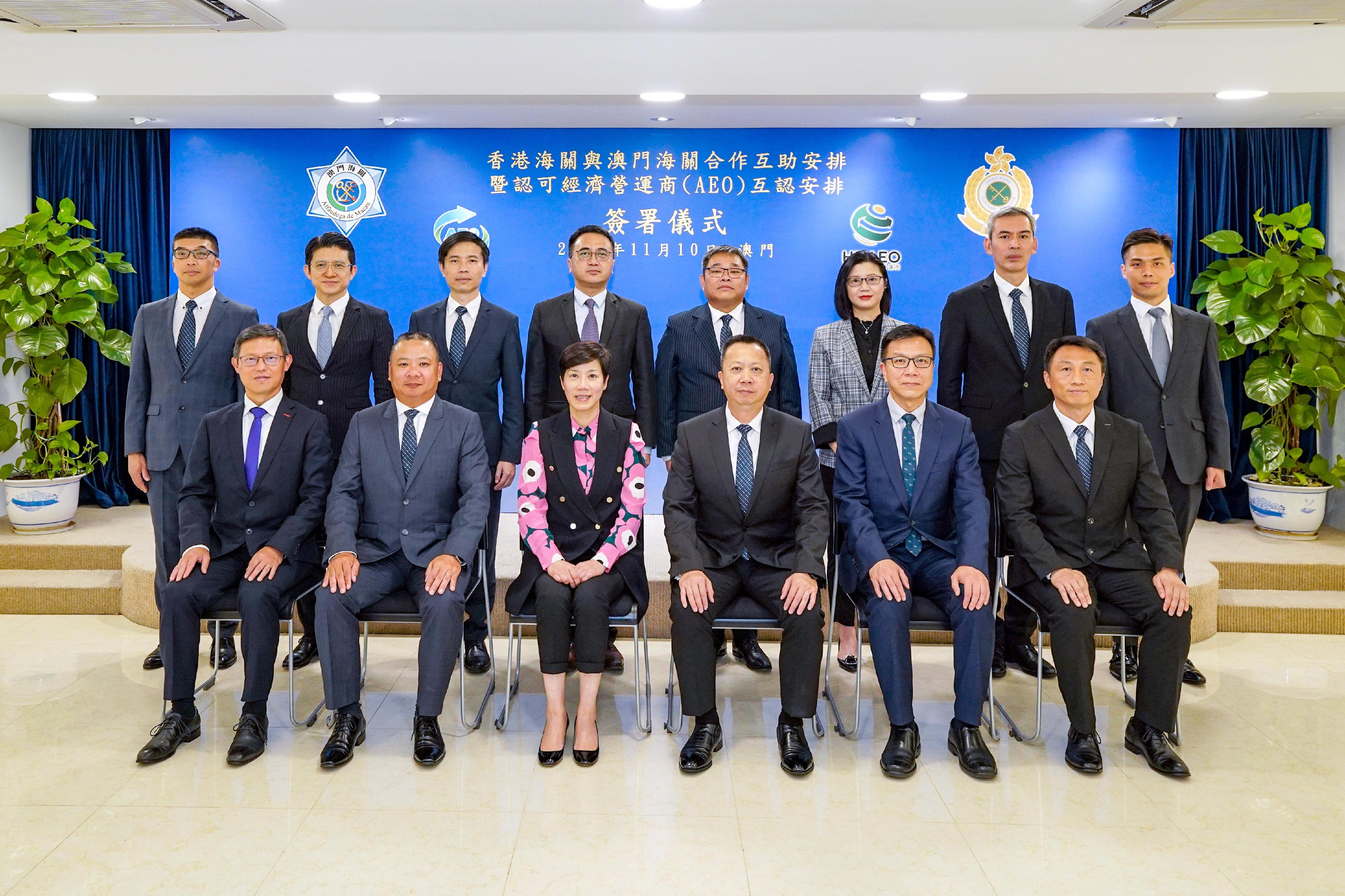 The Commissioner of Customs and Excise, Ms Louise Ho, today (November 10) led a delegation of Hong Kong Customs to visit the Macao Customs Service. Photo shows Ms Ho (front row, third left); the Director-General of the Macao Customs Service, Mr Vong Man-chong (front row, third right); the Deputy Commissioner (Management and Strategic Development), Mr Ellis Lai (front row, second right); the Assistant Commissioner (Excise and Strategic Support), Mr Rudy Hui (front row, first left); and other Hong Kong Customs delegation members and officers of Macao Customs.