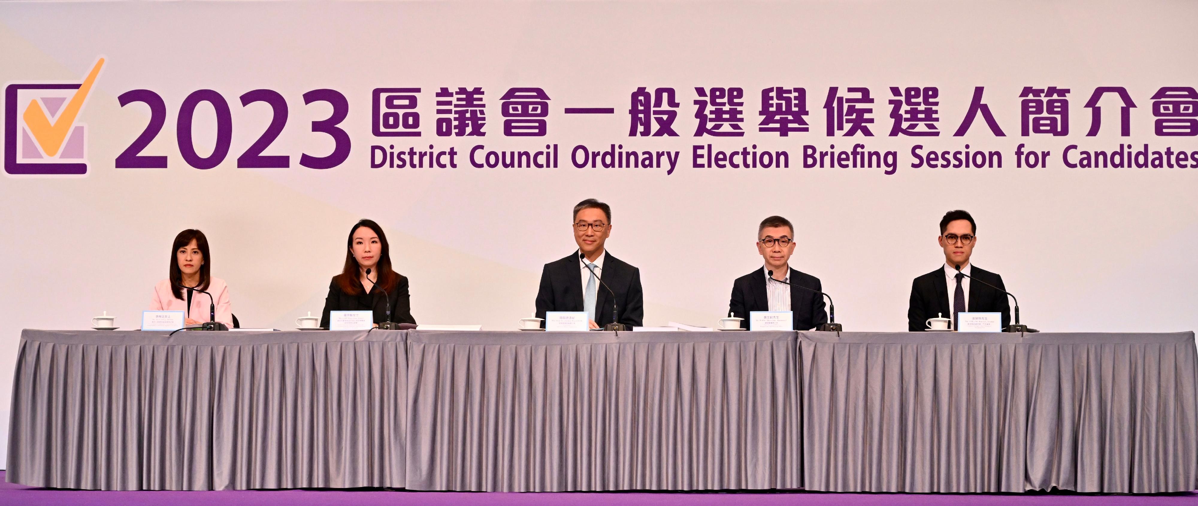 The Chairman of the Electoral Affairs Commission, Mr Justice David Lok, conducted a briefing tonight (November 13) for the candidates of the 2023 District Council Ordinary Election on the electoral arrangements, the guidelines on election-related activities and important points to note in running their electioneering activities. Photo shows (from left) the Programme Co-ordinator (Clean Elections) of the Independent Commission Against Corruption, Ms Debbie Ly; the Senior Assistant Solicitor General (Constitutional Development and Elections) of the Department of Justice, Ms Jenny Law; Mr Justice Lok; the Chief Electoral Officer of the Registration and Electoral Office, Mr Raymond Wang; and the General Manager (Retail Business) of Hongkong Post, Mr Hankie Cheung.