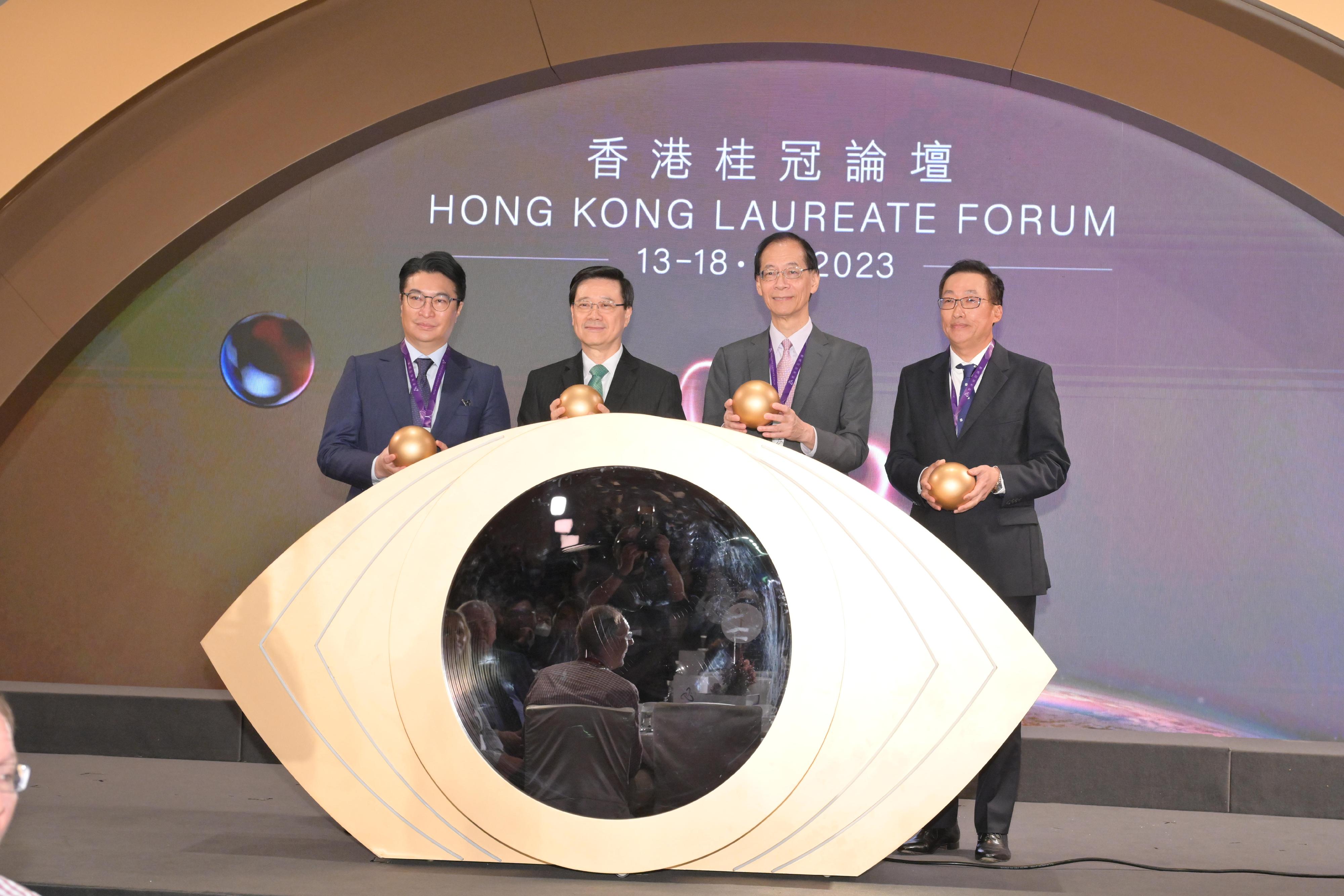 The Chief Executive, Mr John Lee, attended the Hong Kong Laureate Forum today (November 13). Photo shows (from left) the Director of the Lee Shau Kee Foundation, Dr Martin Lee; Mr Lee; the Chairman of the Council of the Hong Kong Laureate Forum, Professor Timothy W Tong; and Board Member of the Council of the Hong Kong Laureate Forum Dr Raymond Chan, officiating at the forum.