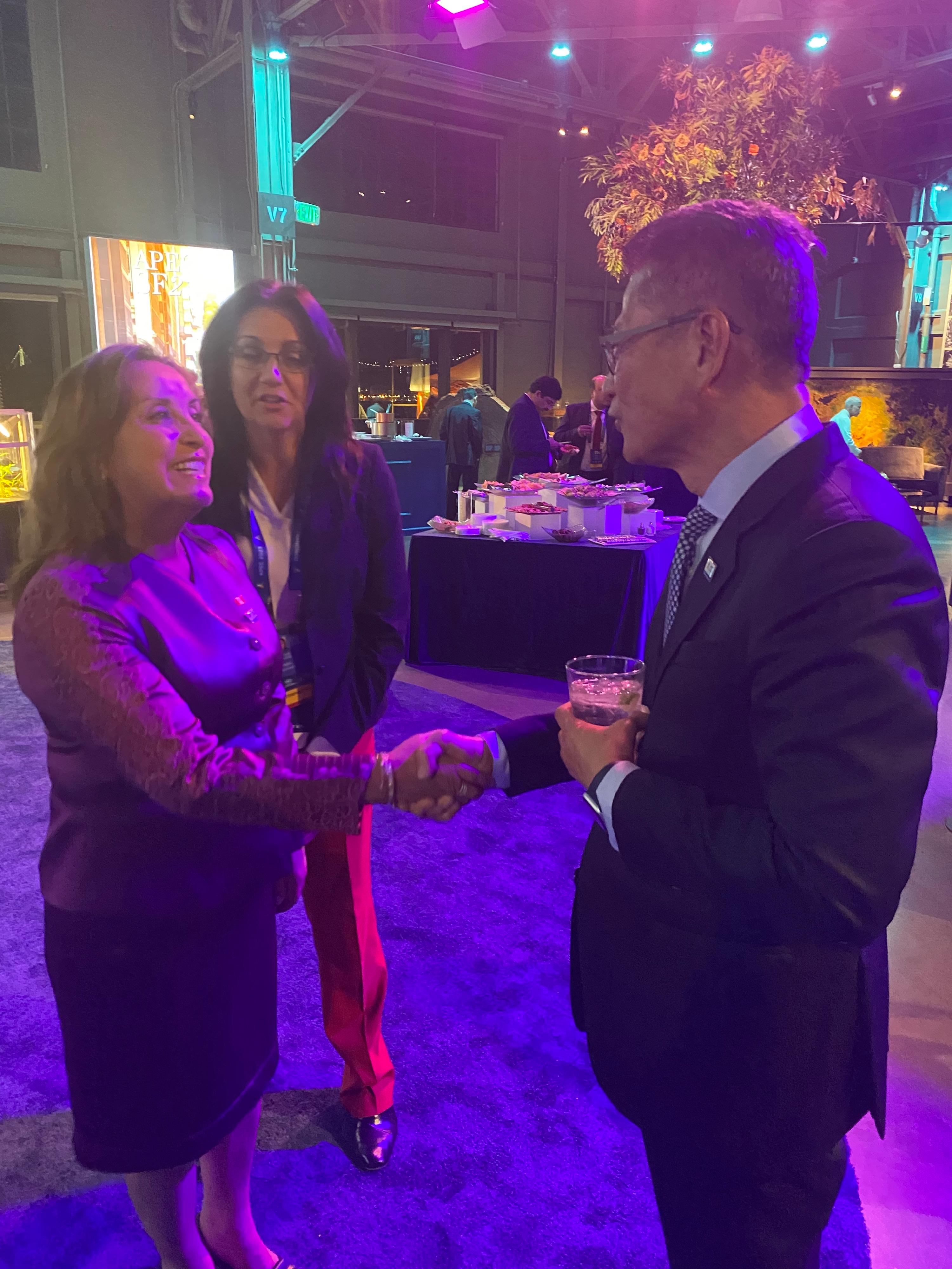 The Financial Secretary, Mr Paul Chan, attended the Asia-Pacific Economic Cooperation Economic Leaders' Meeting welcome reception and cultural performance in San Francisco, the United States, yesterday evening (November 15, San Francisco time). Photo shows Mr Chan (right) chatting with the President of Peru, Ms Dina Boluarte (left), at the welcome reception.