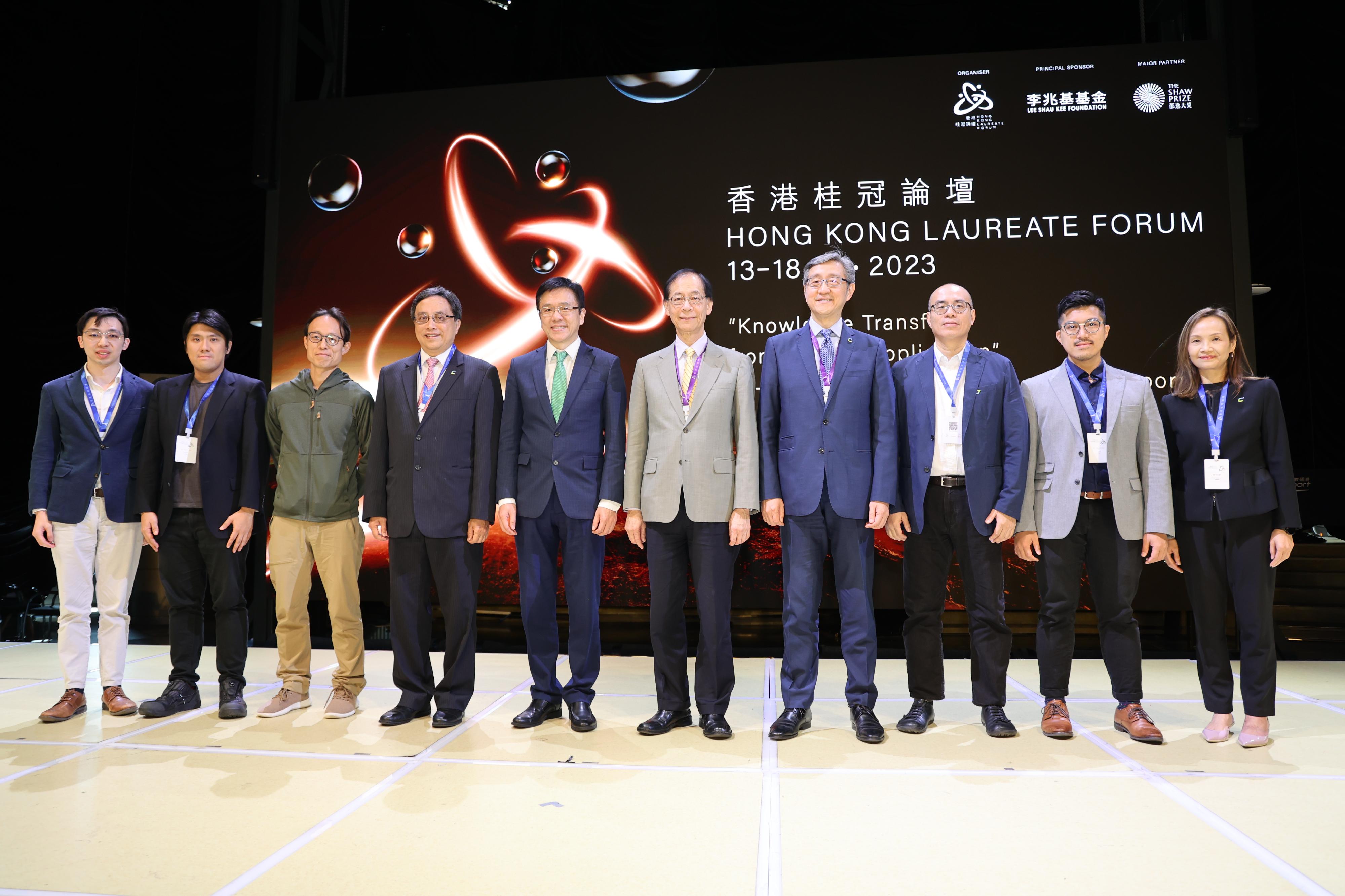The Secretary for Innovation, Technology and Industry, Professor Sun Dong, attended the Hong Kong Laureate Forum 2023 Co-organised Programme with Cyberport: Knowledge Transfer, from R&D to application today (November 17). Photo shows (from fourth left) the Chairman of the Board of Directors of Hong Kong Cyberport Management Company Limited (HKCMCL), Mr Simon Chan; Professor Sun; the Chairman of the Council of the Hong Kong Laureate Forum, Professor Timothy Tong; and the Chief Executive Officer of HKCMCL, Mr Peter Yan, at the event.